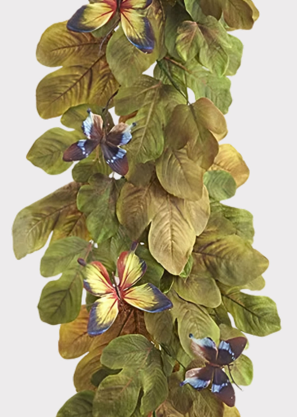 Close-up of an artificial magnolia leaf garland with butterflies