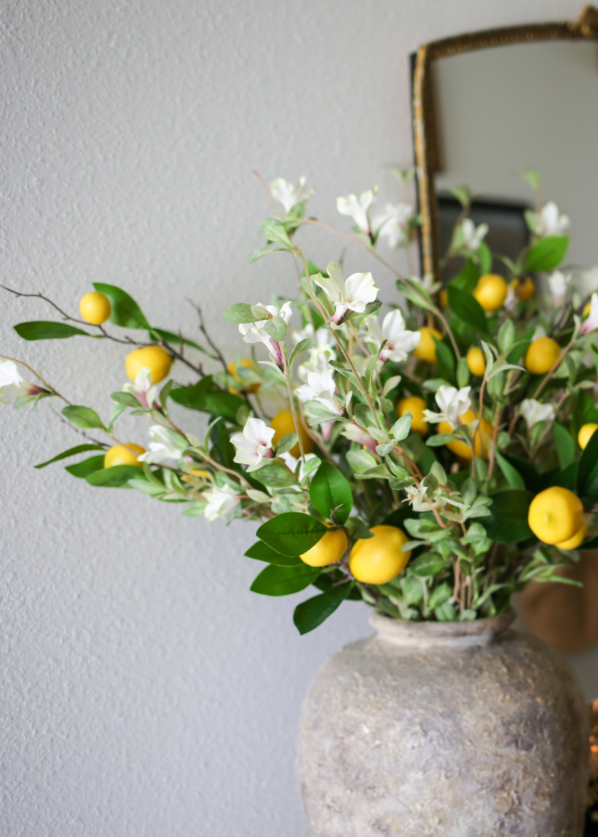 Close-up of Faux Petunia and Orange Arrangement