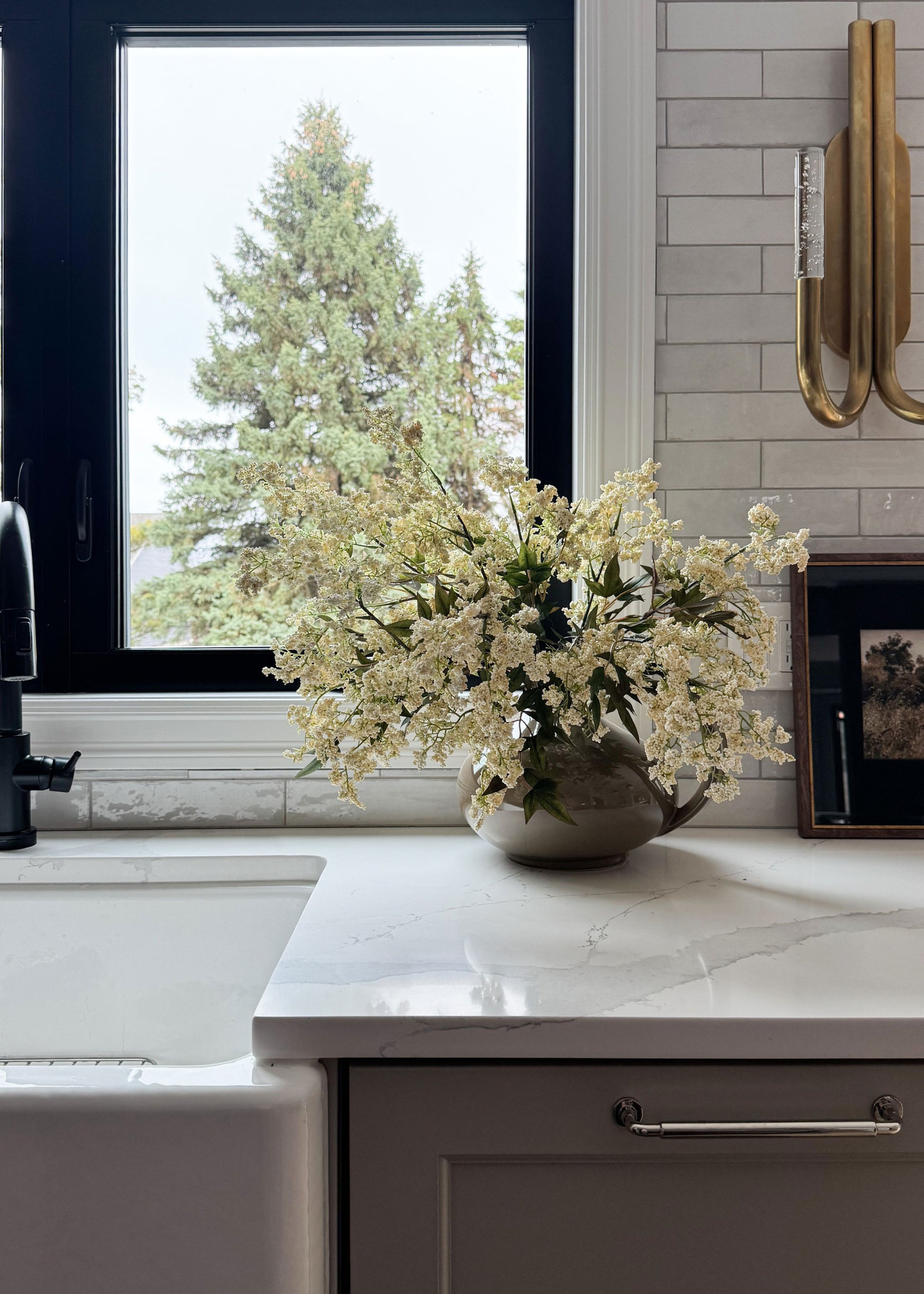 Creams Plum Berry Branches Styled in a Kitchen