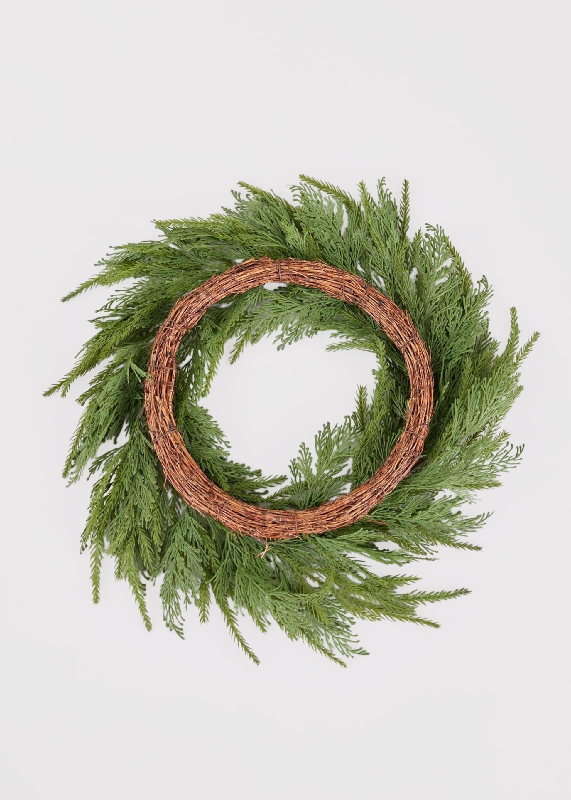 Backside View of Artificial UV Treated Cedar Wreath at Afloral