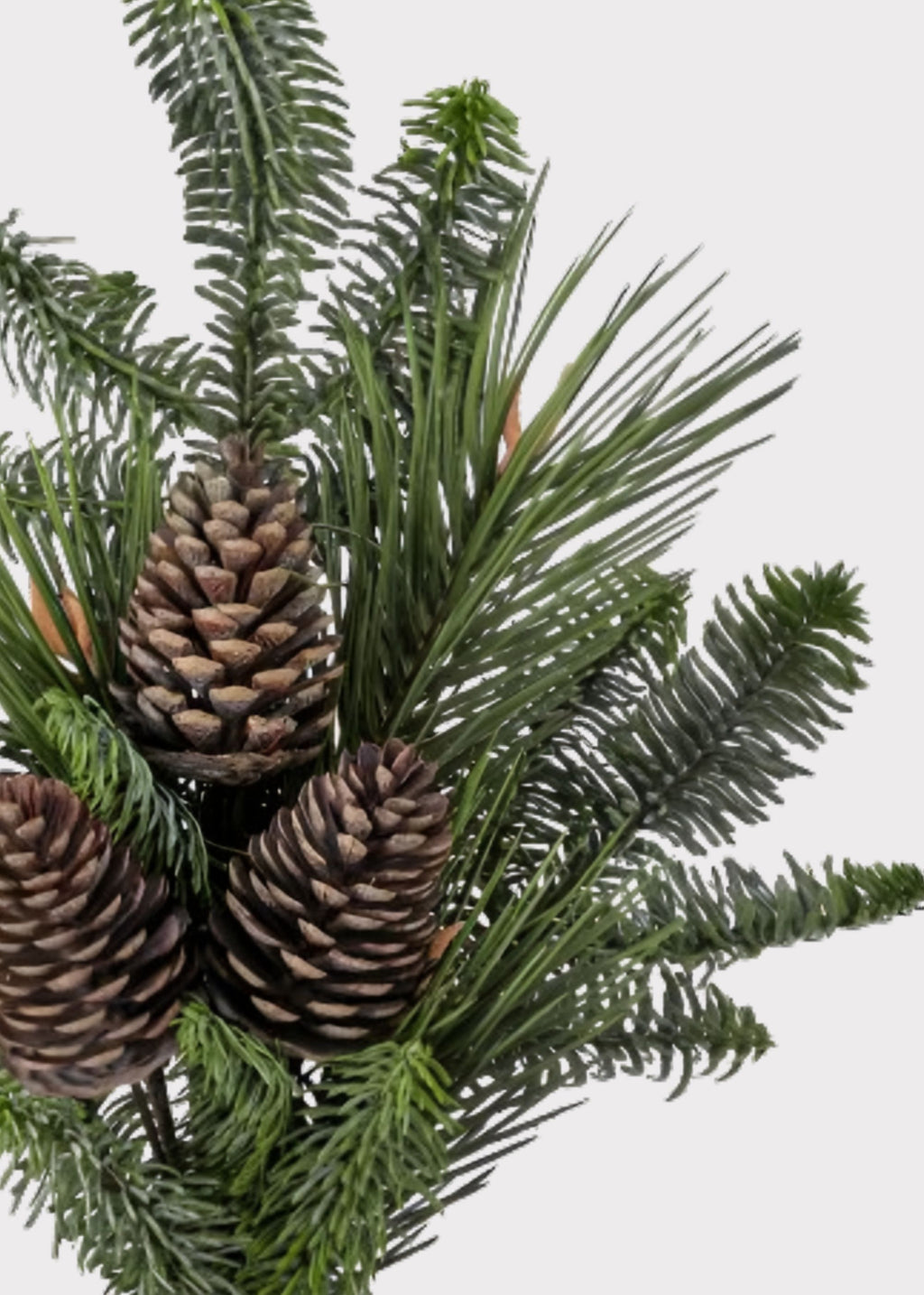 Close-up of a Fake Winter Pine and Cone Bundle