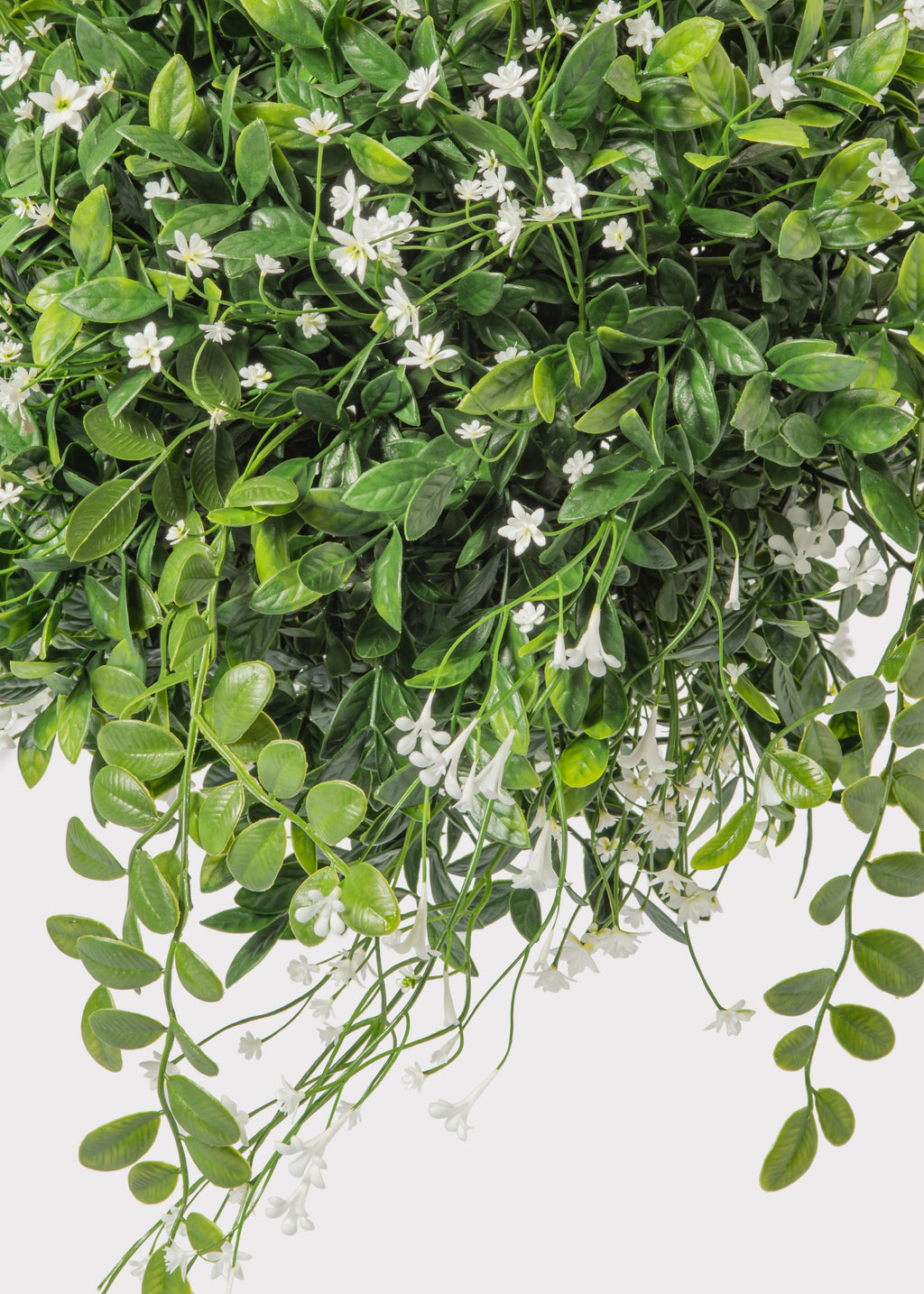 Close-up of a Fake Flower and Boxwood Hanging Plant