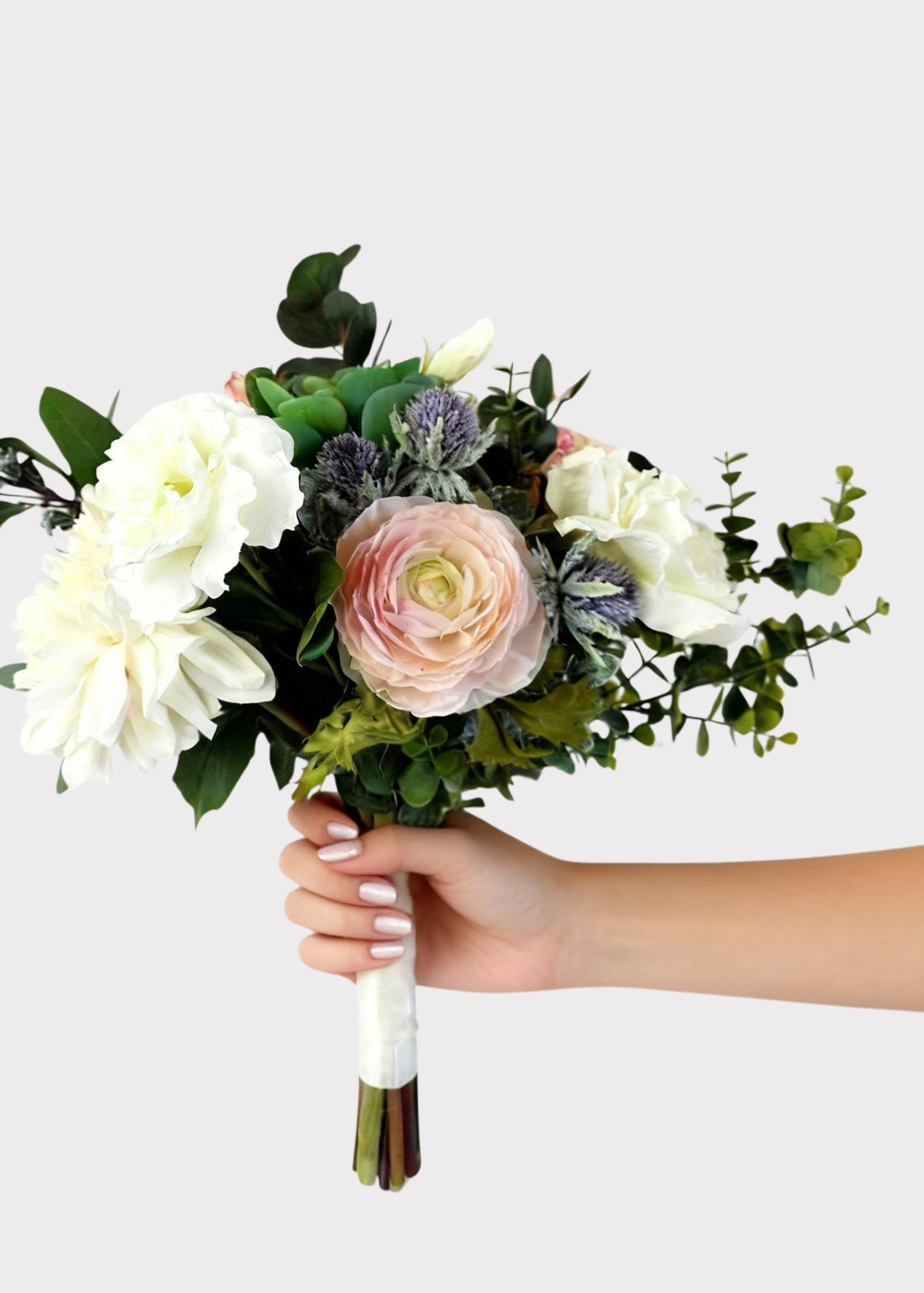 Bouquet of roses and succulents held by a hand 