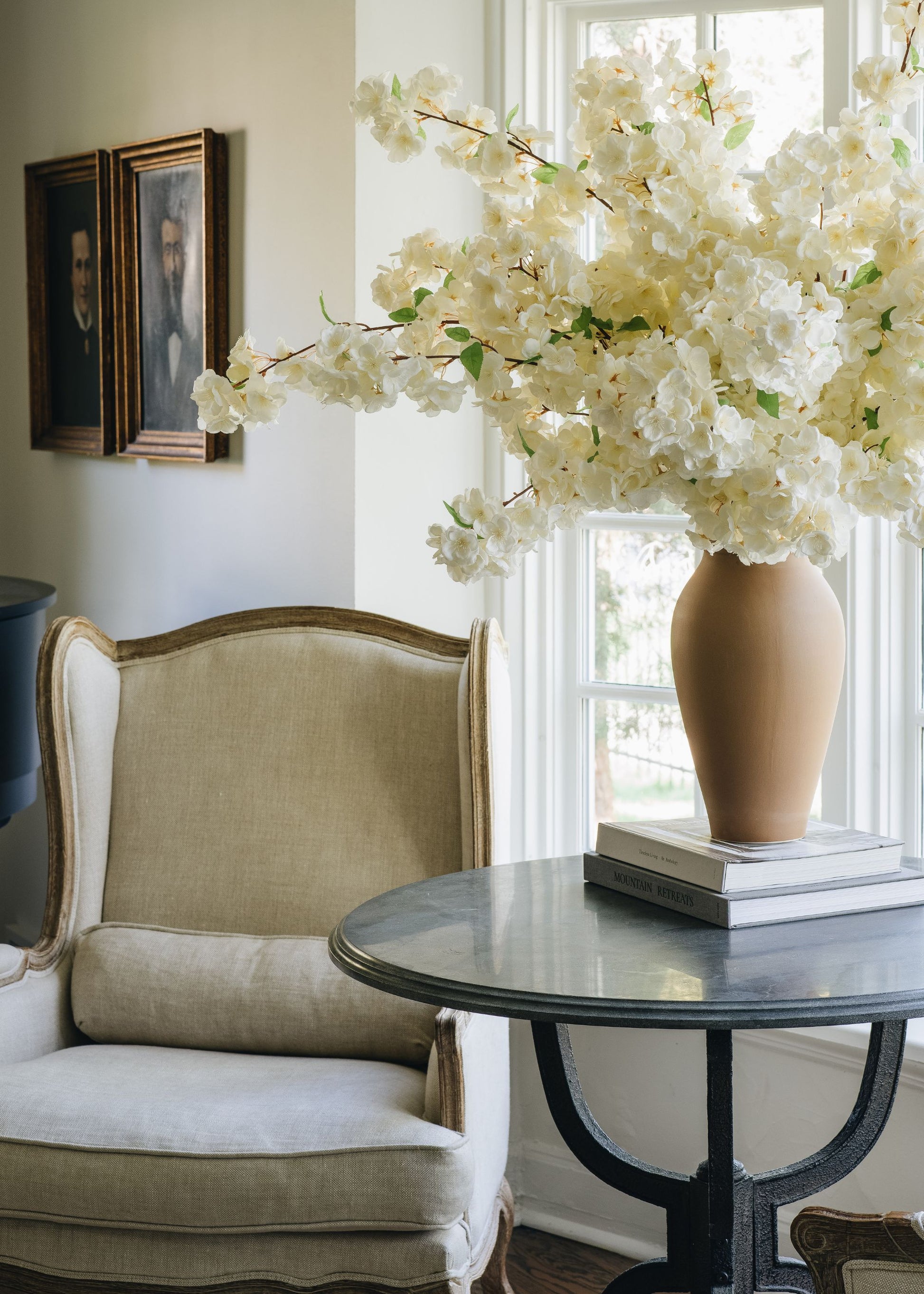 large vase of white cherry blossom flowers