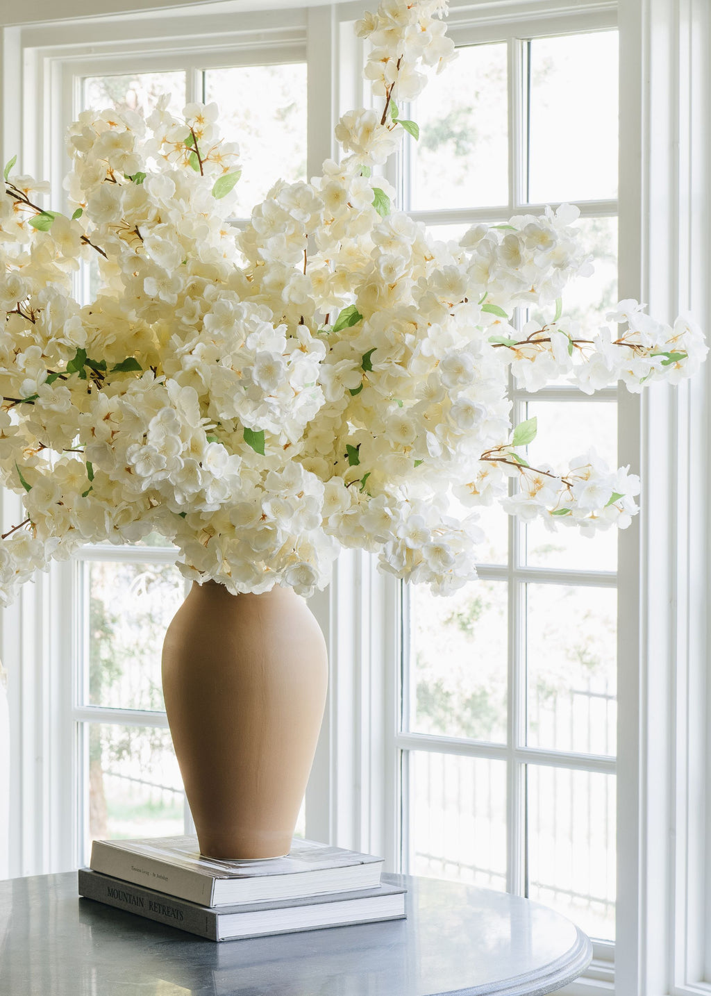White floral arrangement of cherry blossoms from Afloral