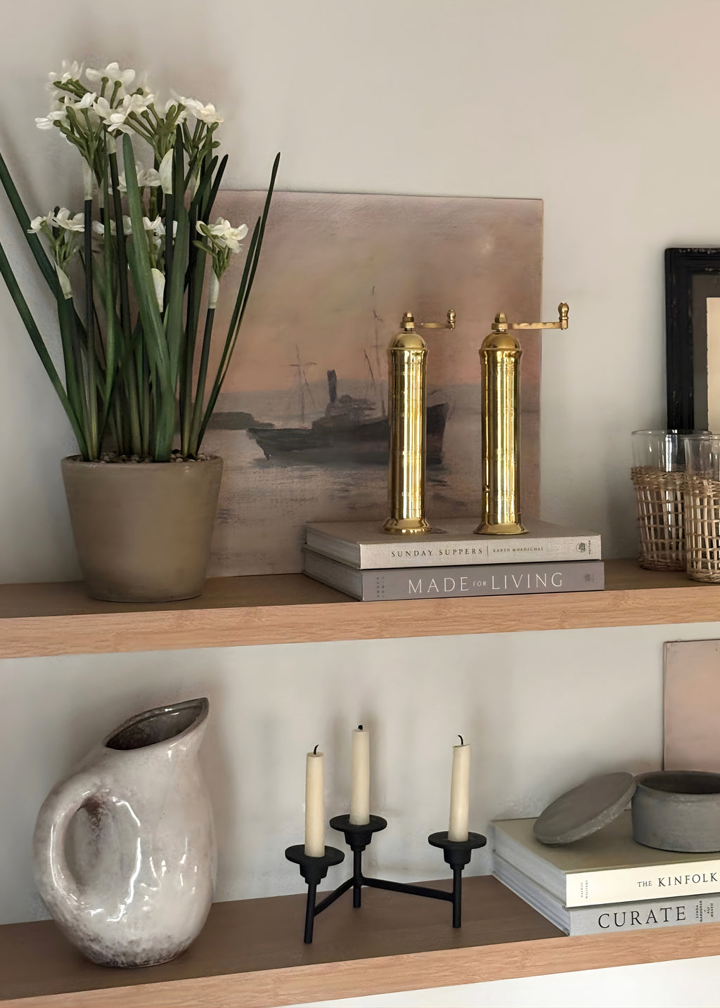 artificial paper whites in stoneware pot
