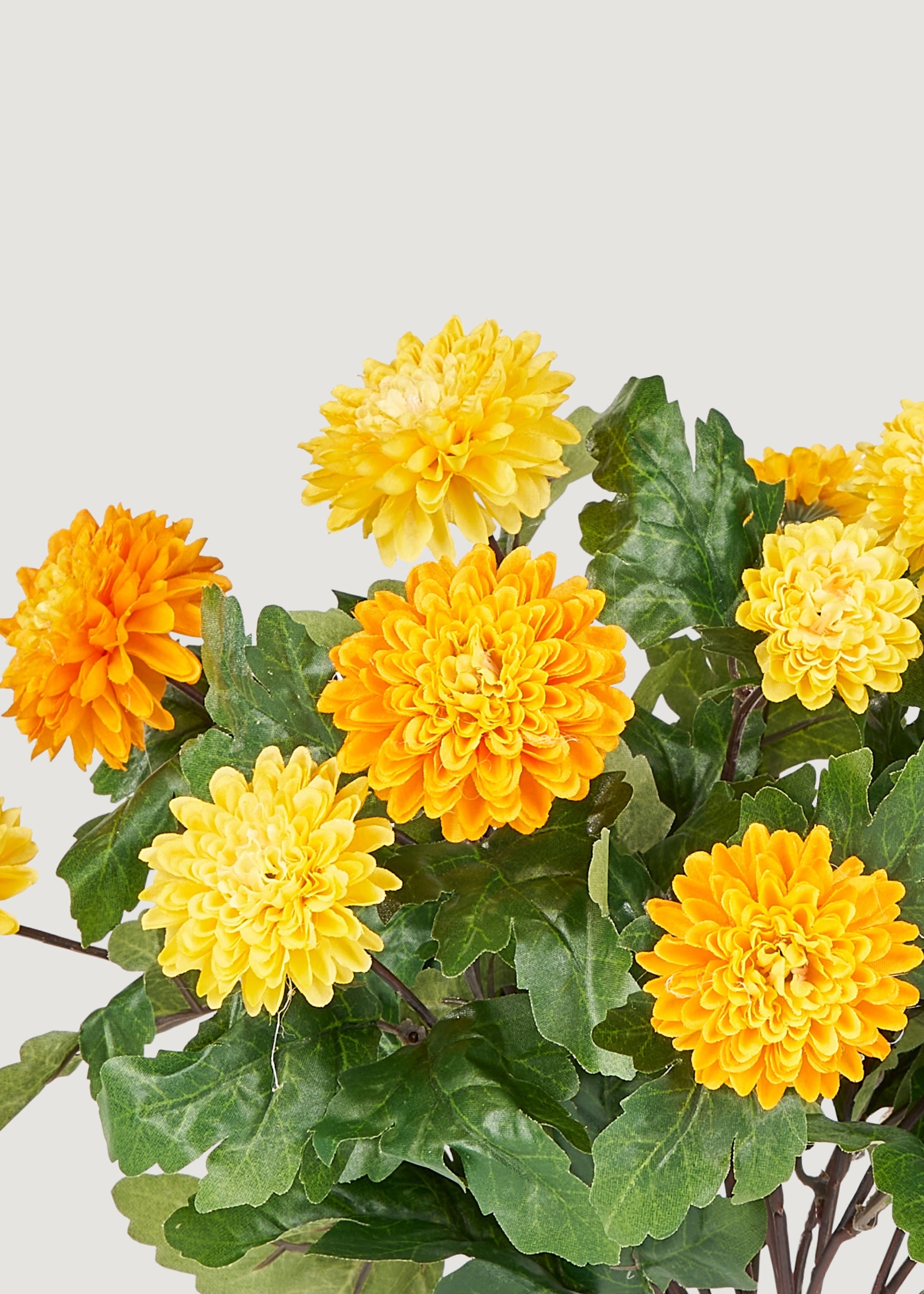 Close-up of Yellow and Orange Artificial Mum Flower Bush
