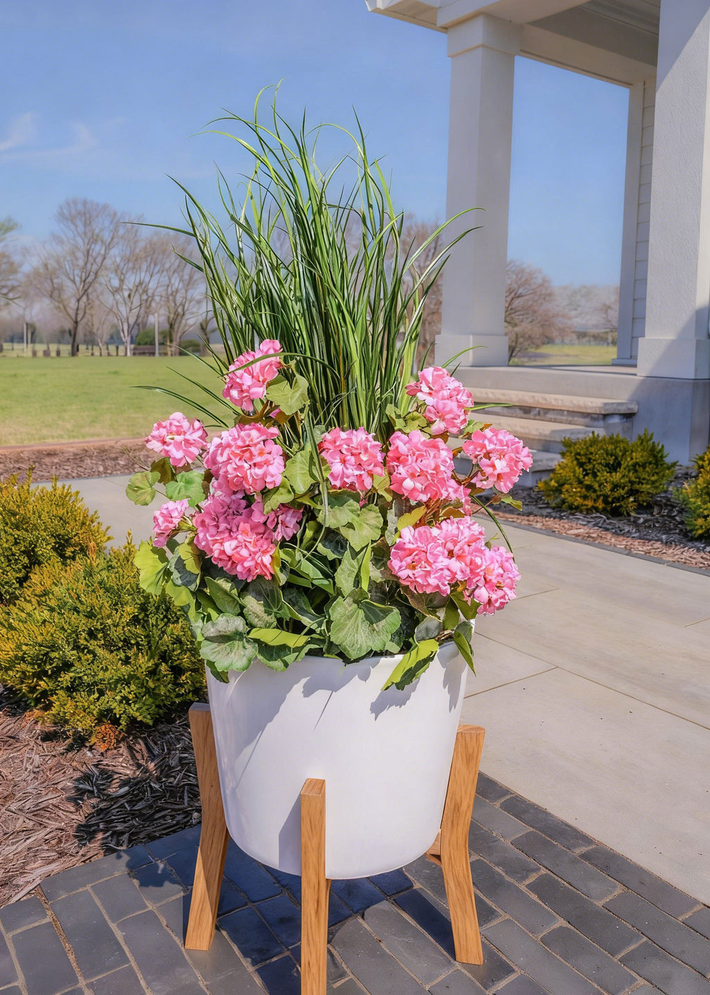 Pink Geraniums and Grass Bush Outdoor Flower Planter