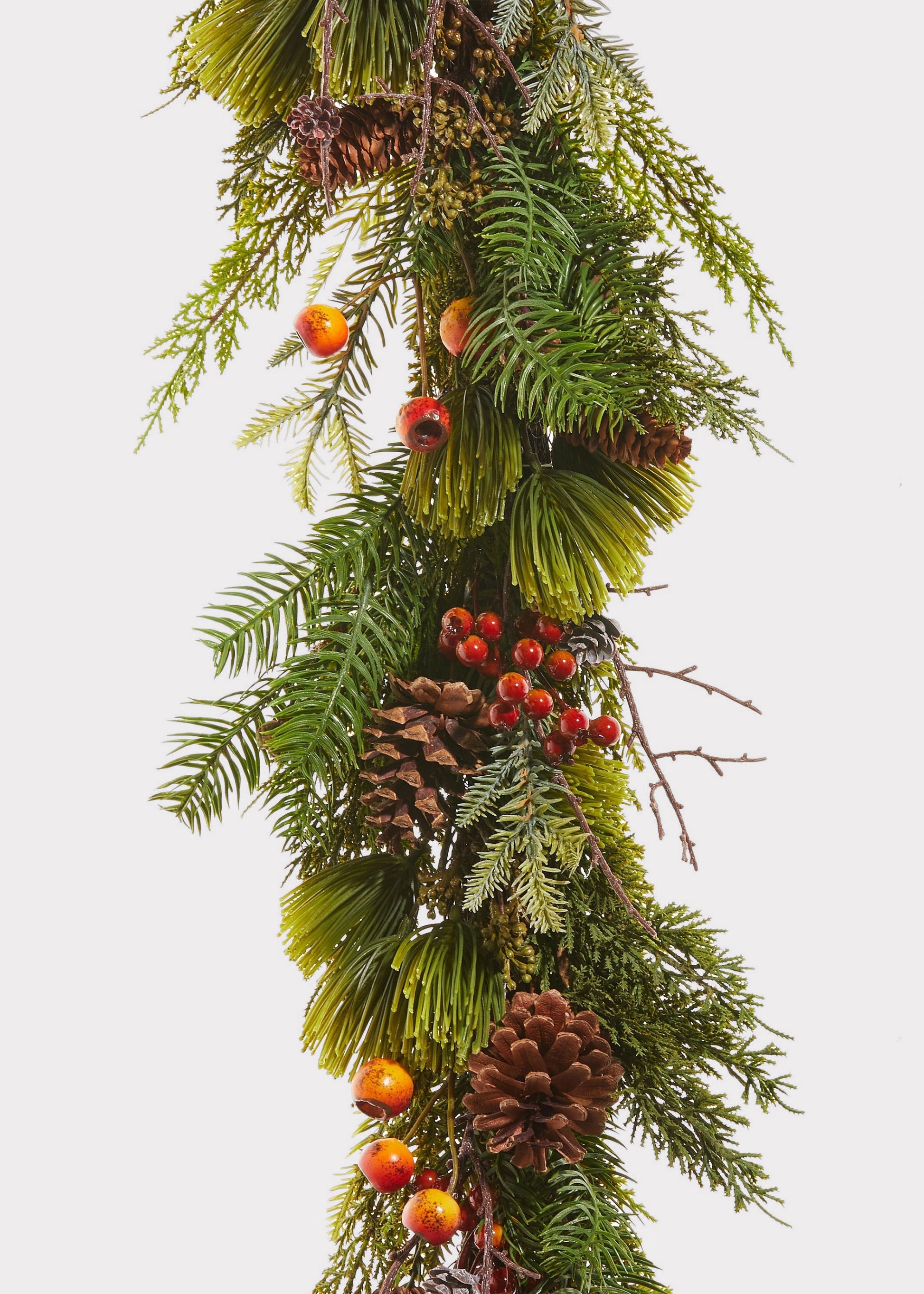 Close-up of Artificial Winter Greens and Berry Pod Garland 