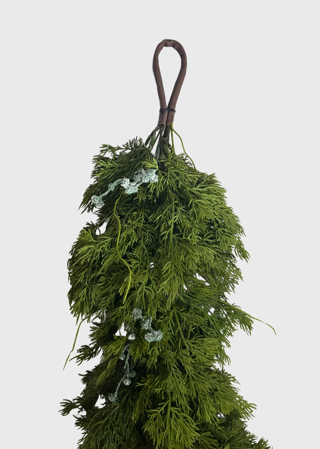 hoop at the end of the artificial juniper garland