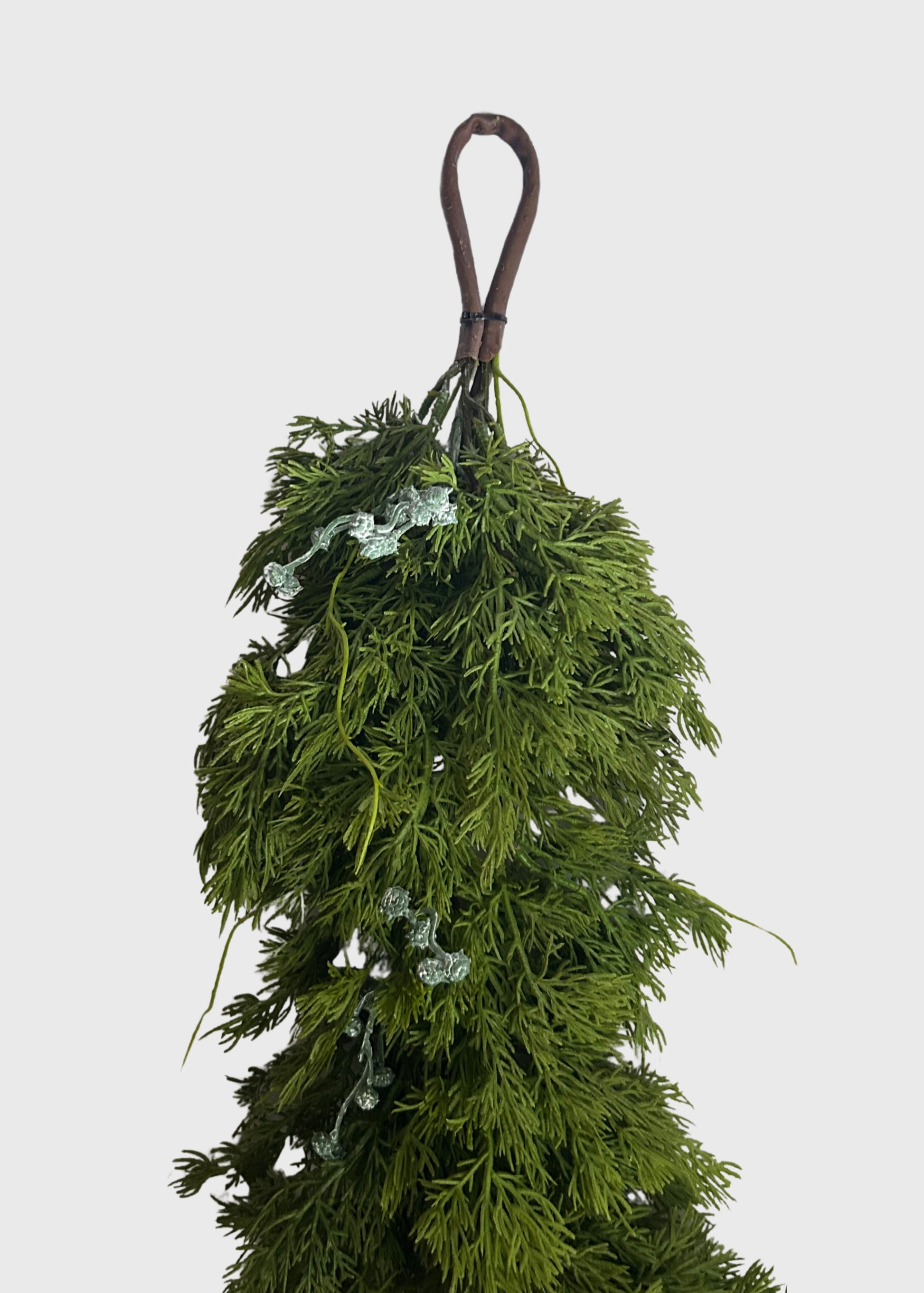 hoop at the end of the artificial juniper garland