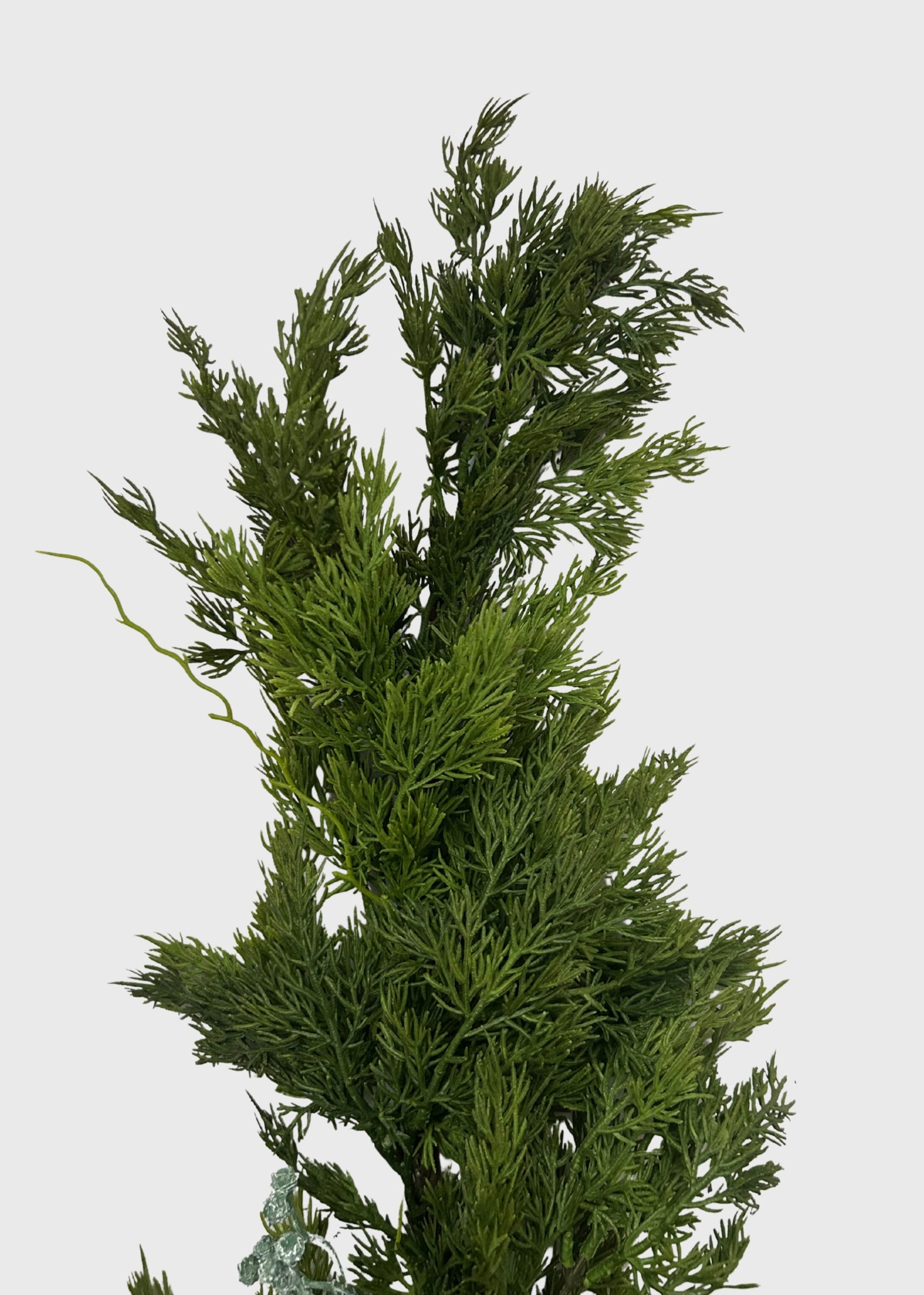 An artificial green conifer tree garland with dense, needle-like foliage