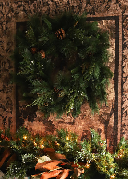 Artificial Juniper and Cedar Winter Wreath hung over mantel