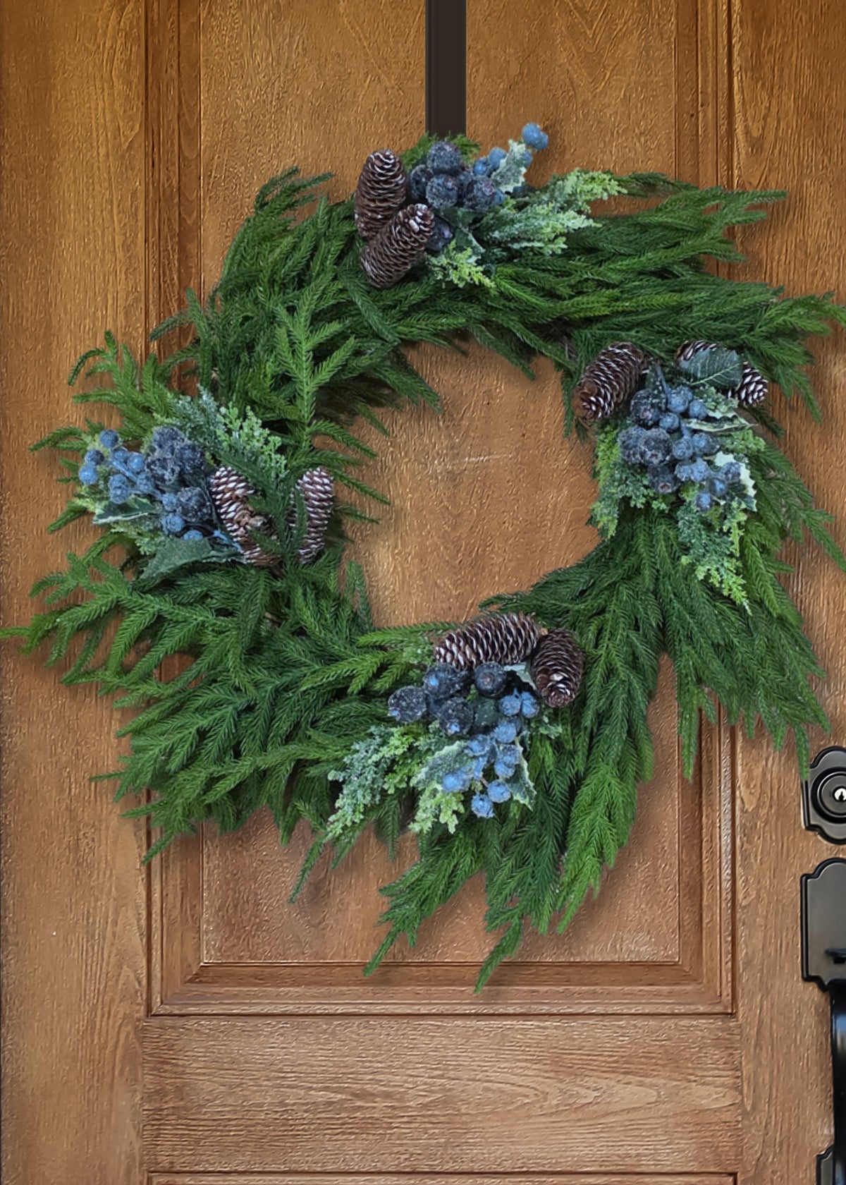 Fake Cedar and Pine Cone Winter Pick with Blue Beaded Berries on Norfolk Pine Wreath