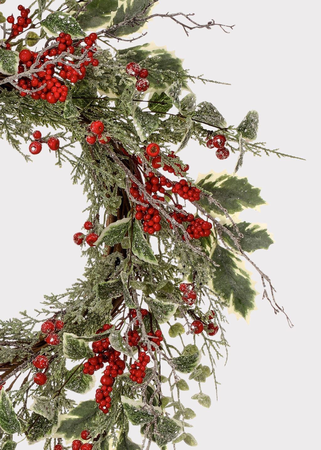 Close-up of Frosted Red Berry and Holly Wreath