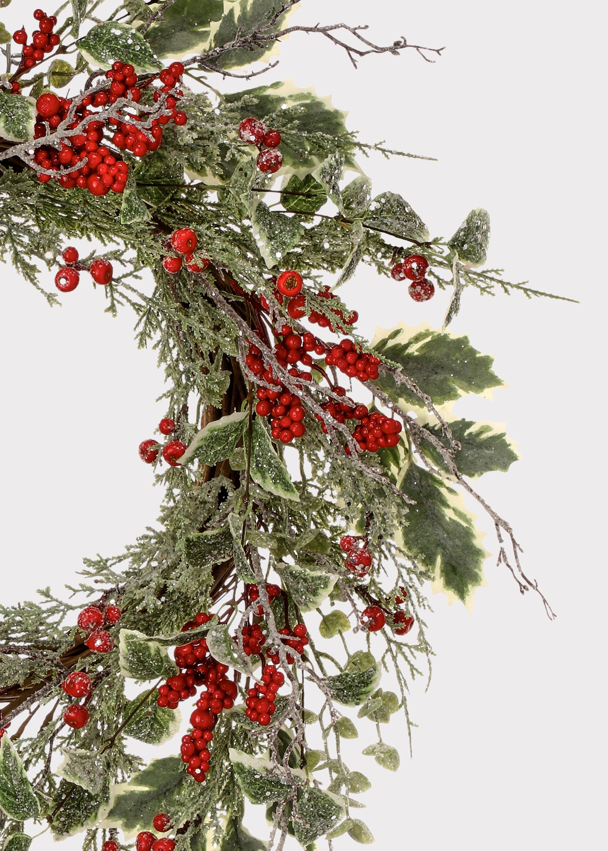 Close-up of Frosted Red Berry and Holly Wreath