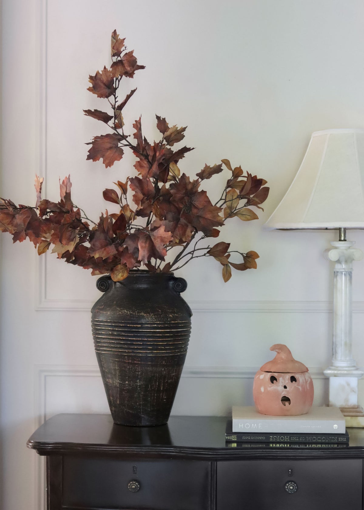 fall maple and Enkianthus leaves arranged in vase