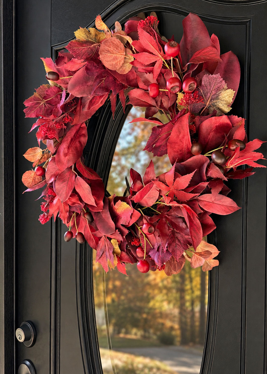 Fall Burgundy Artificial Foliage Wreath on a dark door