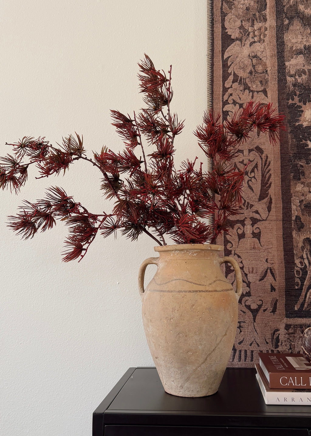 Burgundy Fake Pine Foliage Branches Arranged in a Vase