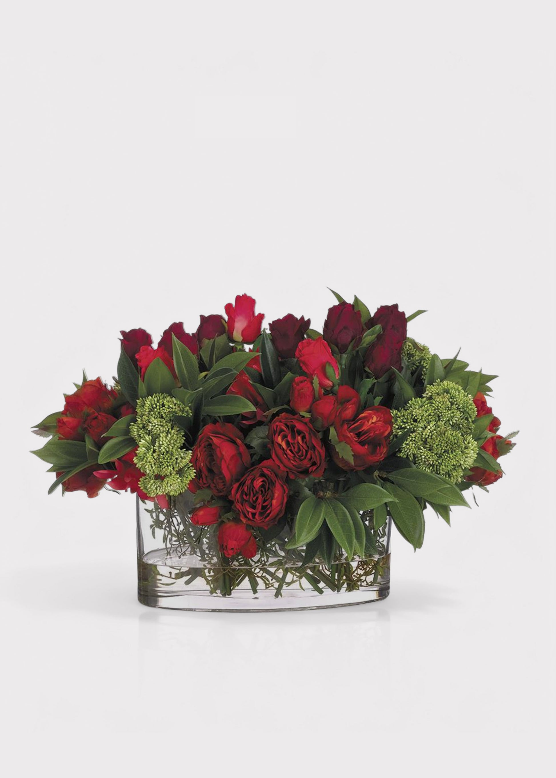 Red Fake Rose and Dahlia Flower Arrangement in Oval Glass Vase