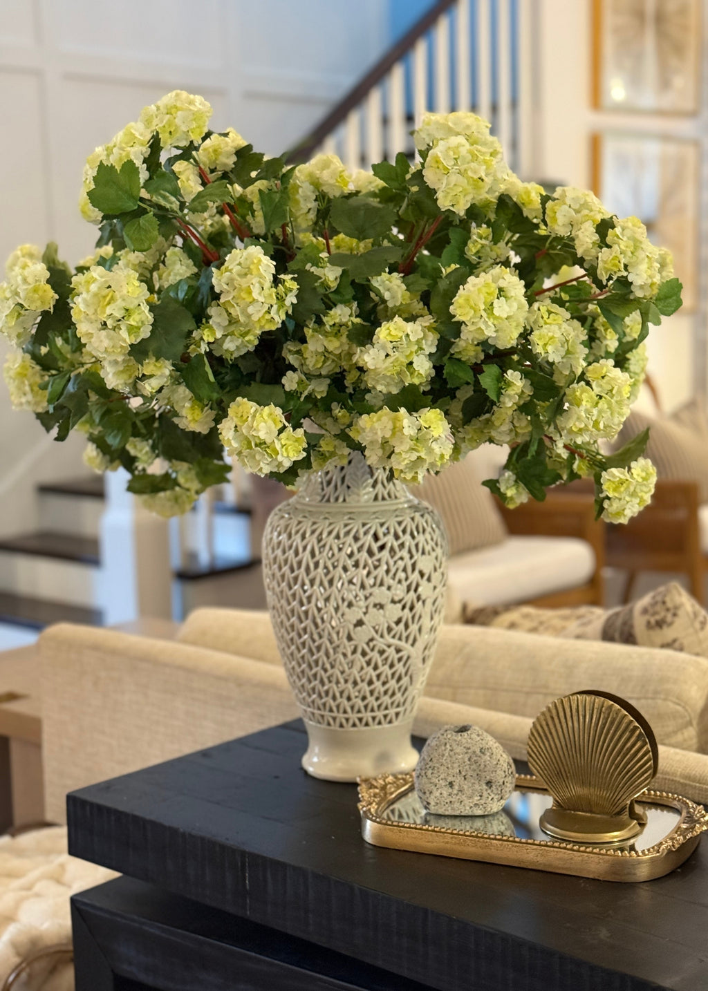 Decorative vase with green snowballs