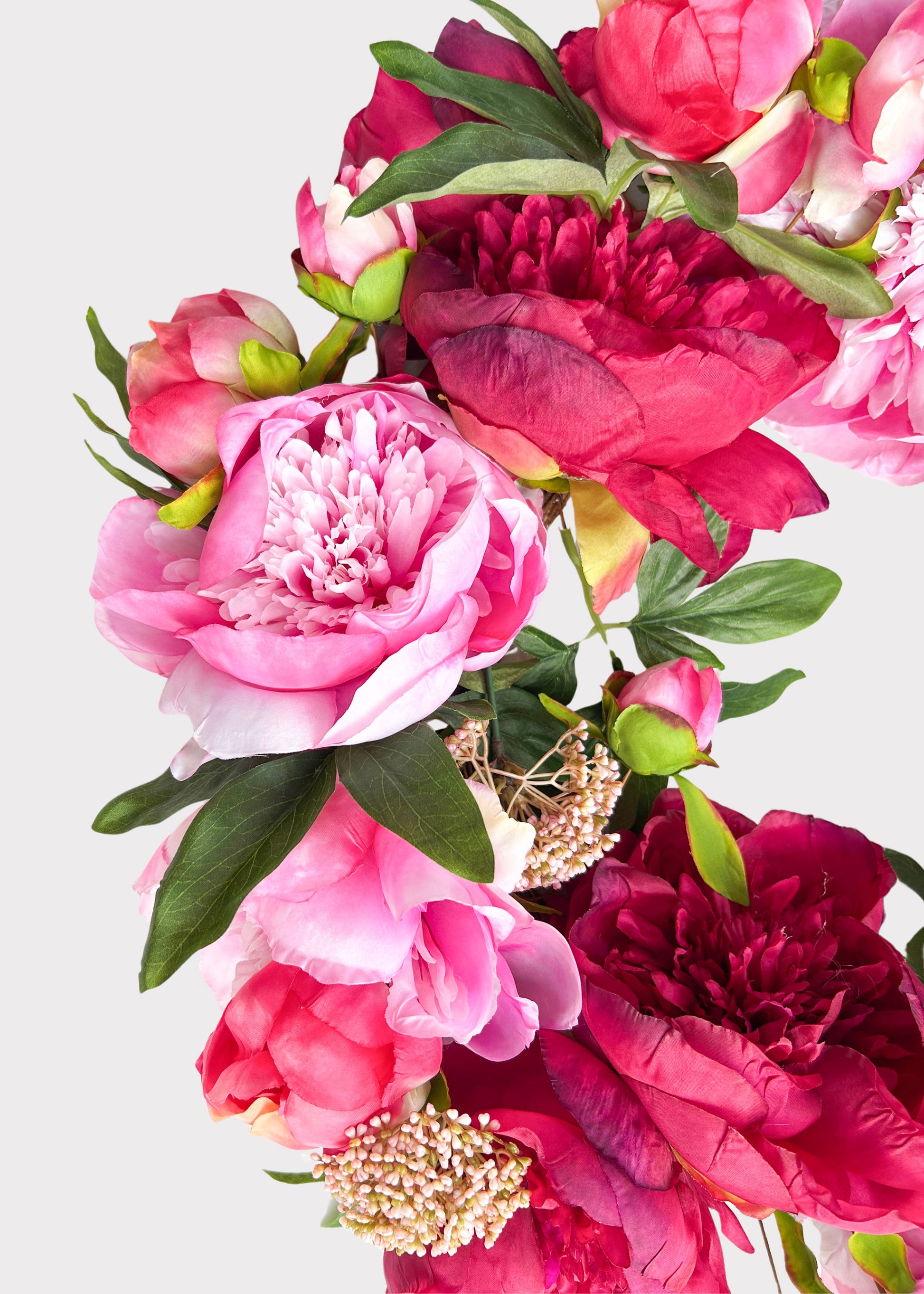 Close-up of a Pink and Burgundy Blooming Peony Fake Flower Wreath