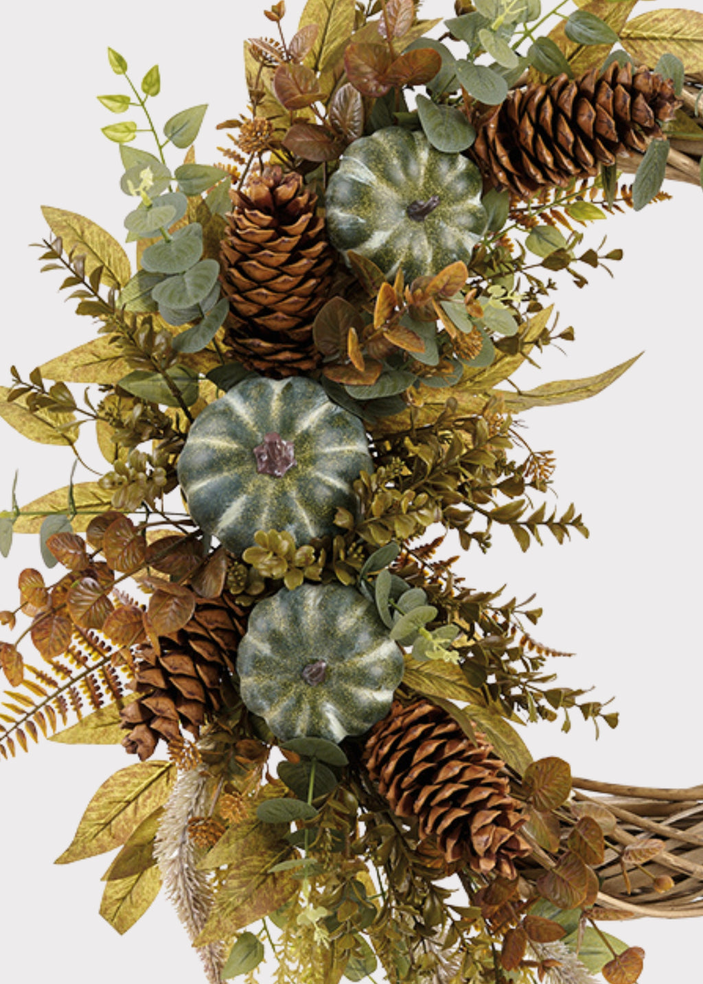 Close-up of a Green Fake Pumpkin and Eucalyptus Fall Wreath