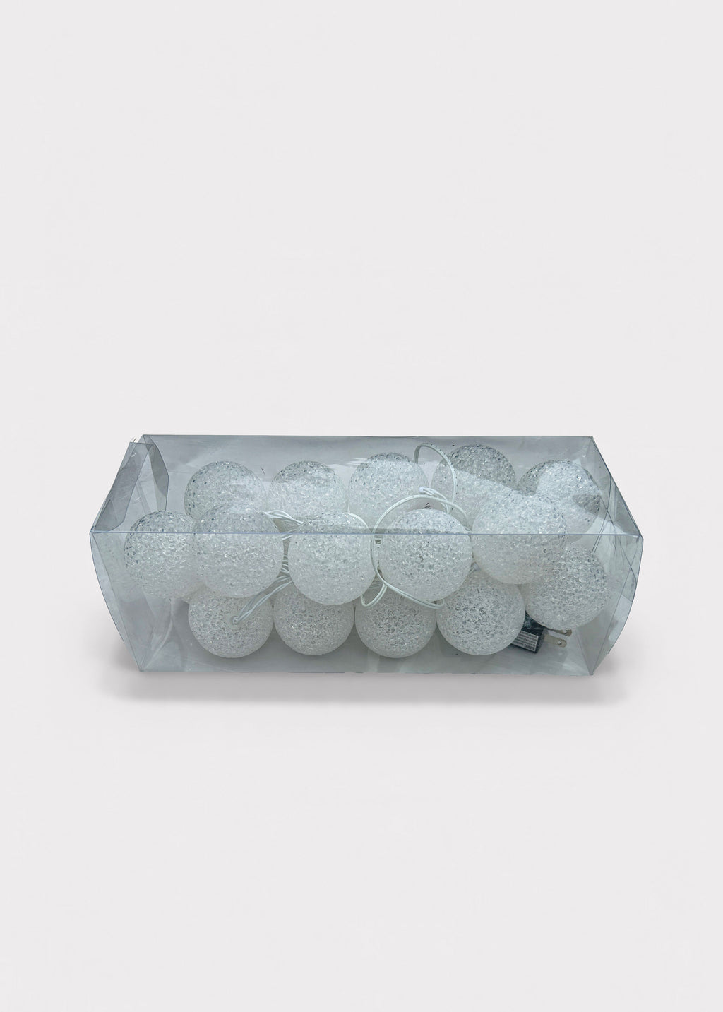 A rectangular clear plastic container filled with Pre-Lit Ball Ornament Garland with White Lights 