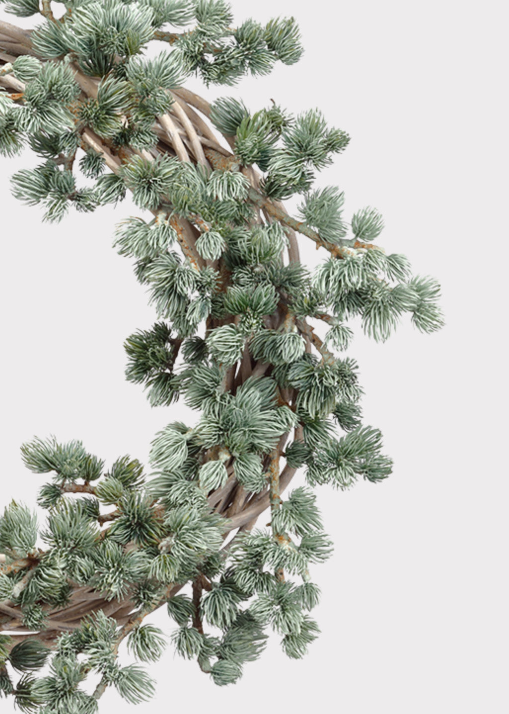 Close-up of Deluxe Artificial Ming Pine Winter Wreath in Frosted Green