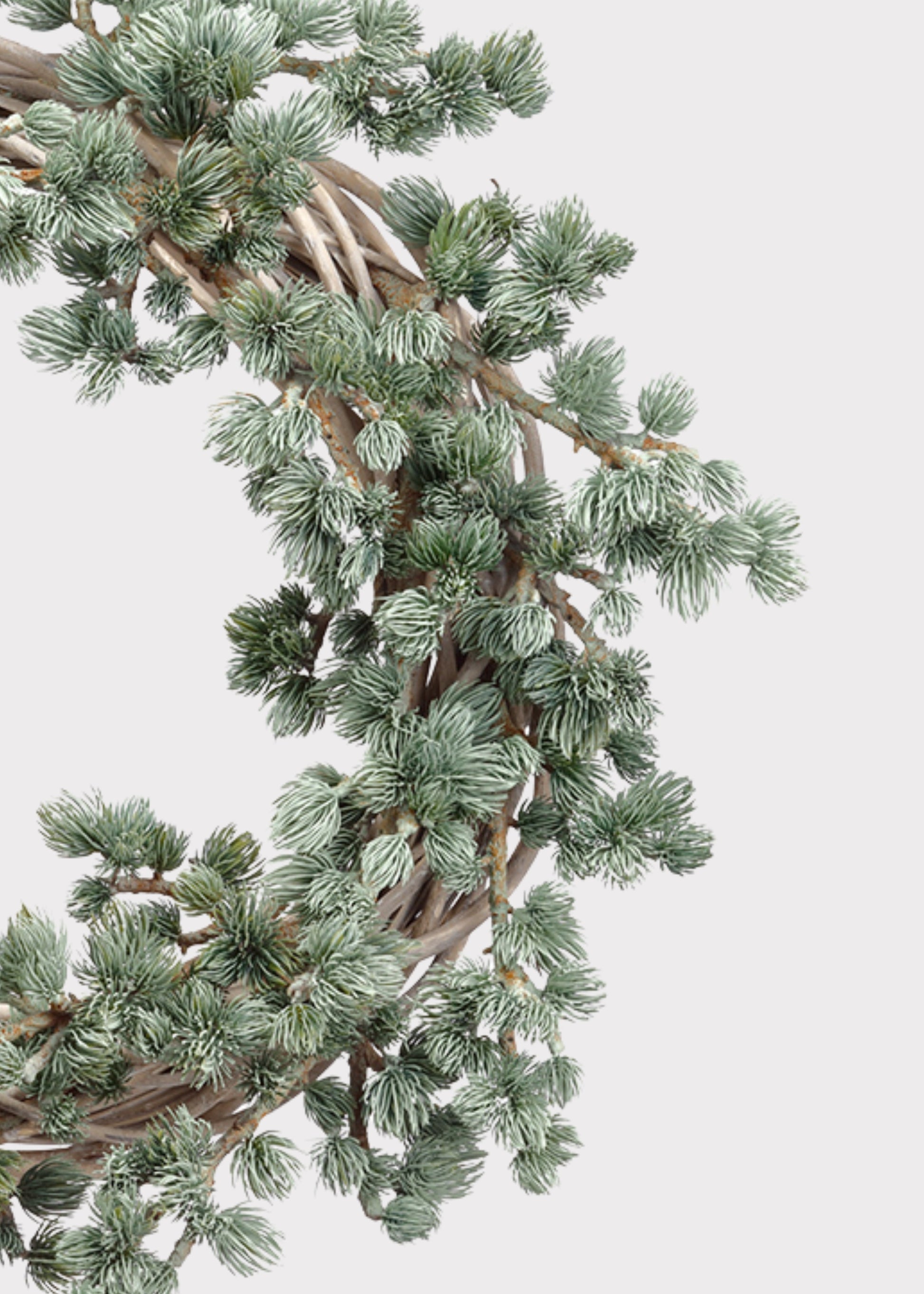 Close-up of Deluxe Artificial Ming Pine Winter Wreath in Frosted Green
