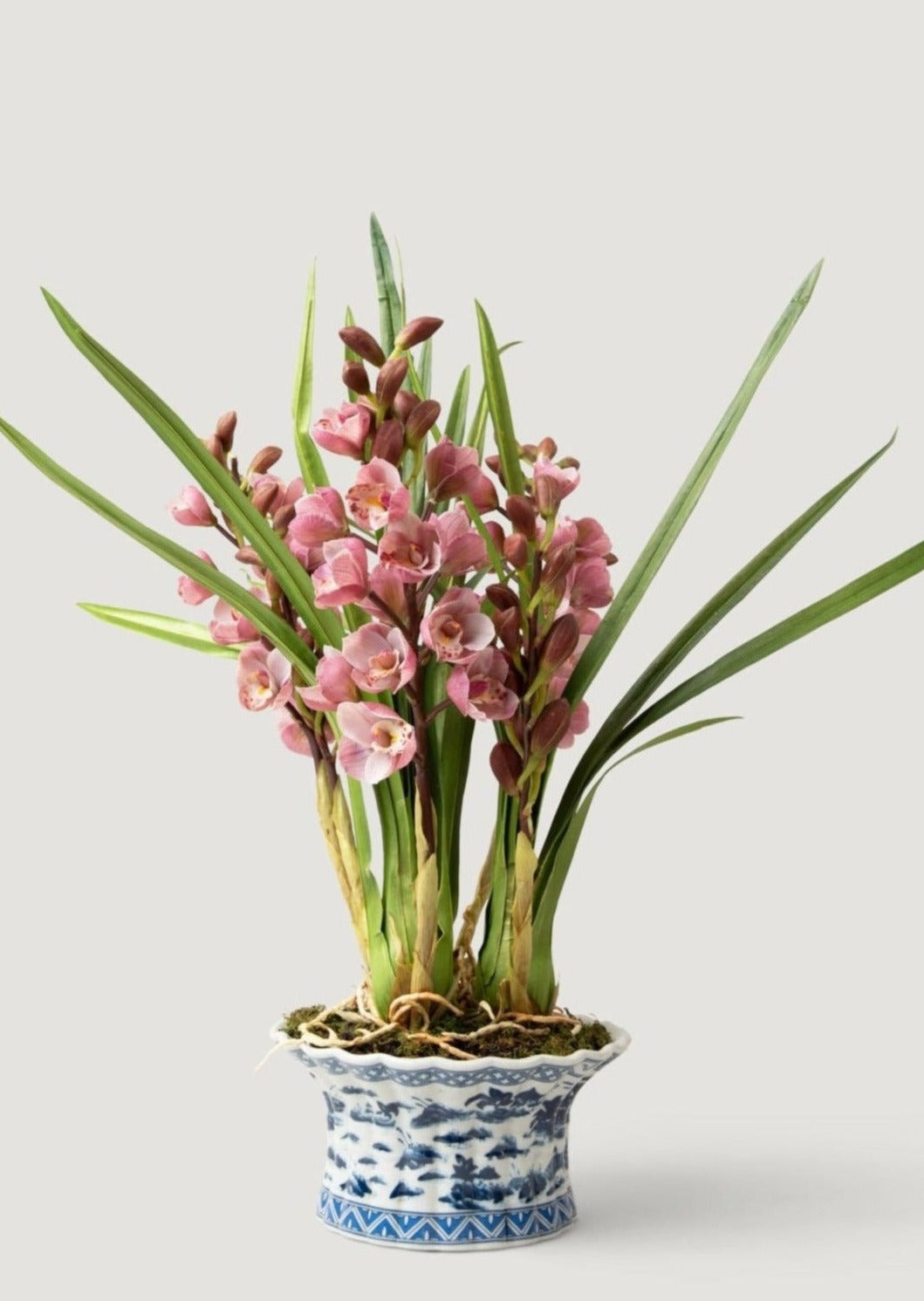 Faux Blooming Flowers Arrangement of Mauve Orchids in Ceramic Pot