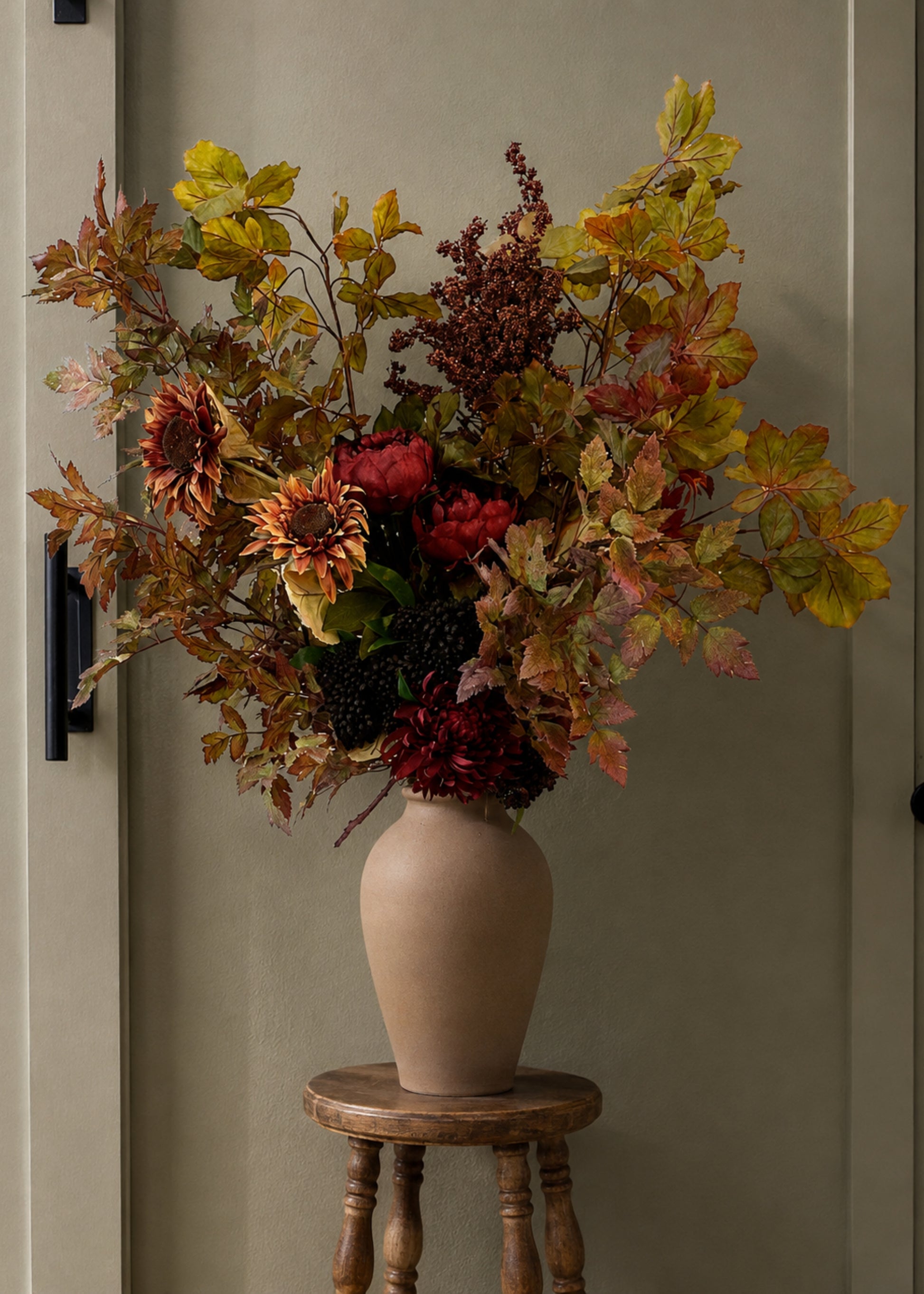 fall chestnut, cimicifuga, peonies, and sunflower arrangement