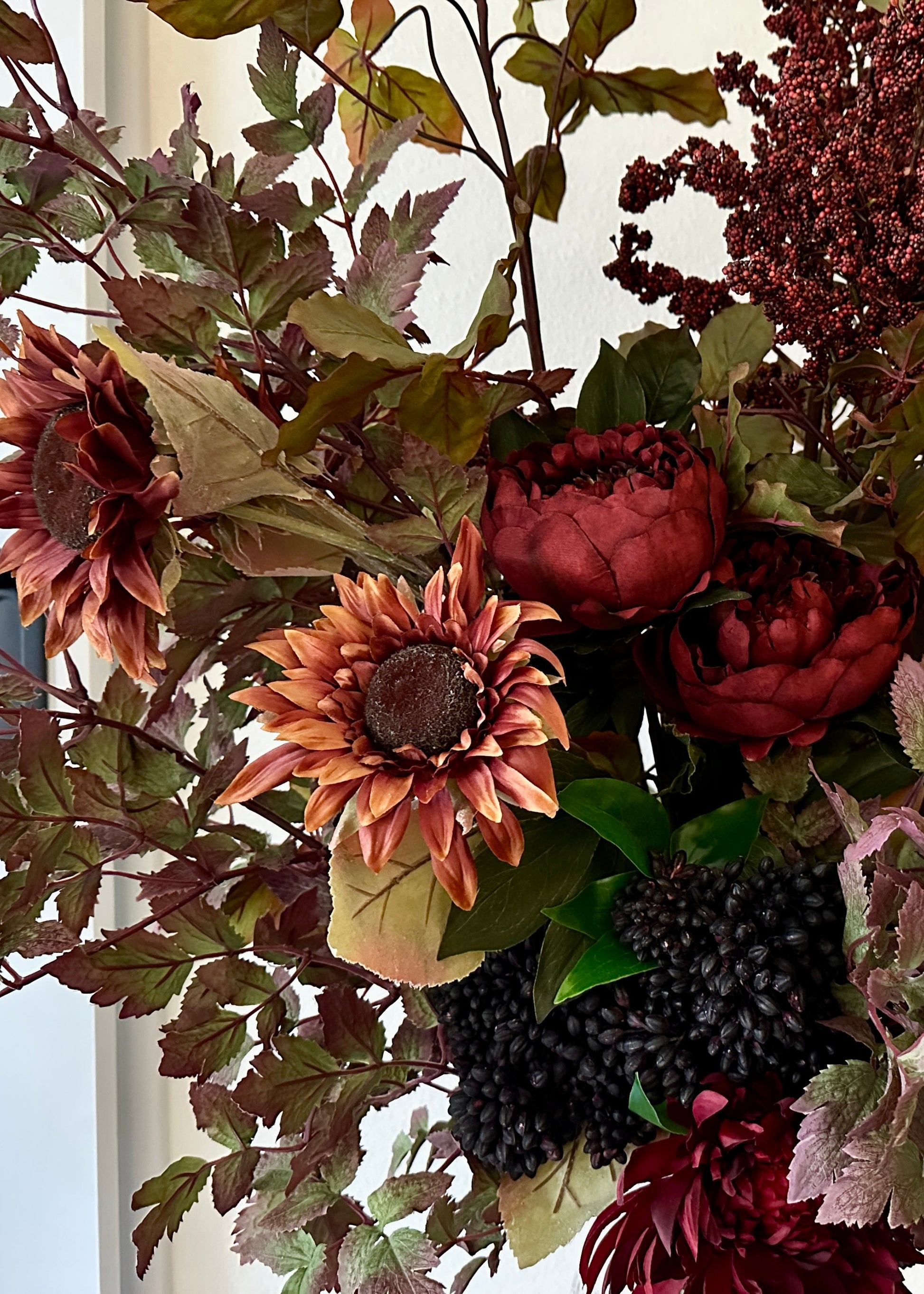 artificial sunflowers, peonies, and cimicifuga