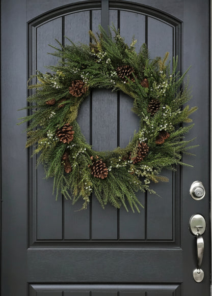 Faux Evergreen Wreath with Berries and Pine Cones on Black Door