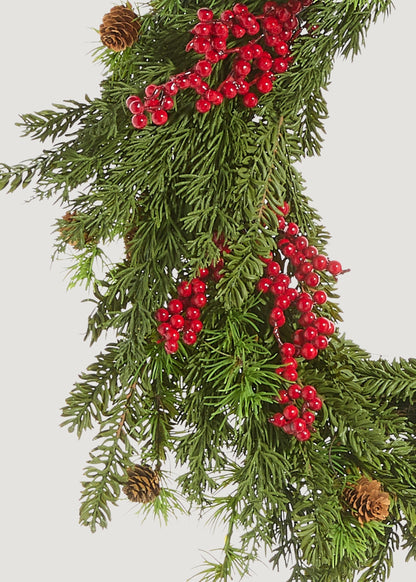 Close-up of Artificial Cedar and Red Berry Wreath