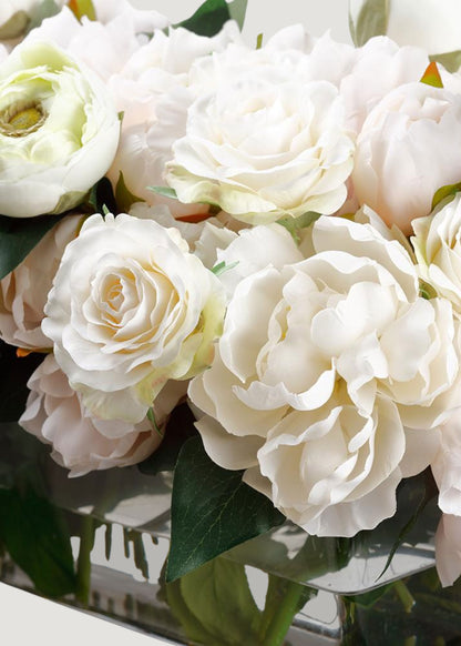 Close-up of Peony and Rose Arrangement in Glass Vase