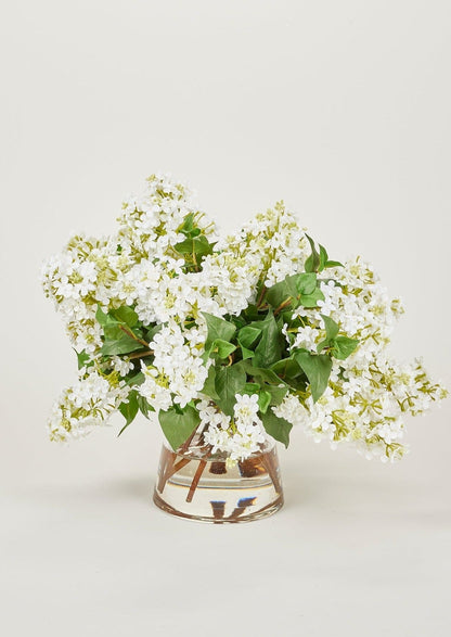 Afloral Faux Flower Arrangement of White Lilacs in Glass Vase