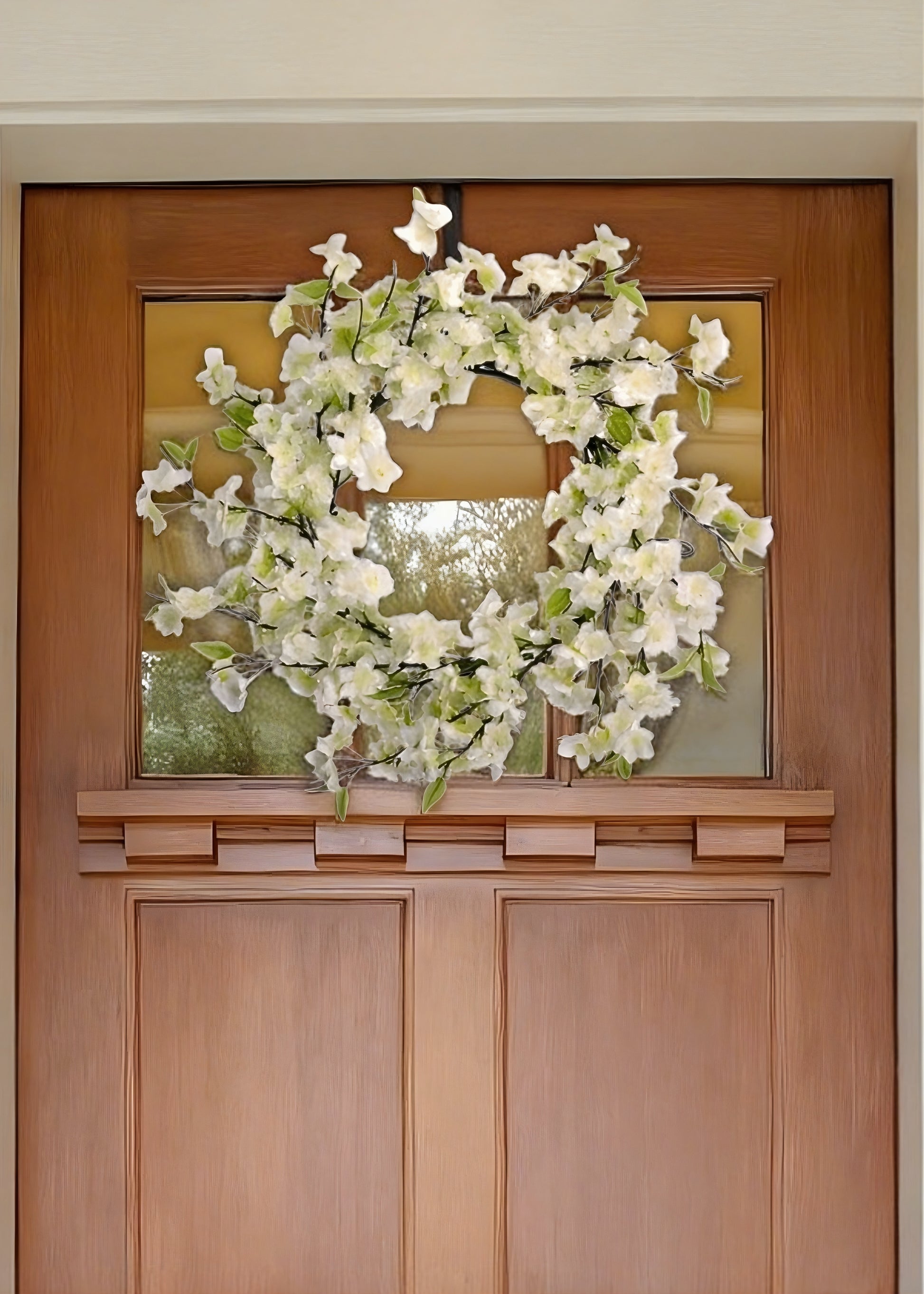wreath of cherry blossoms on door