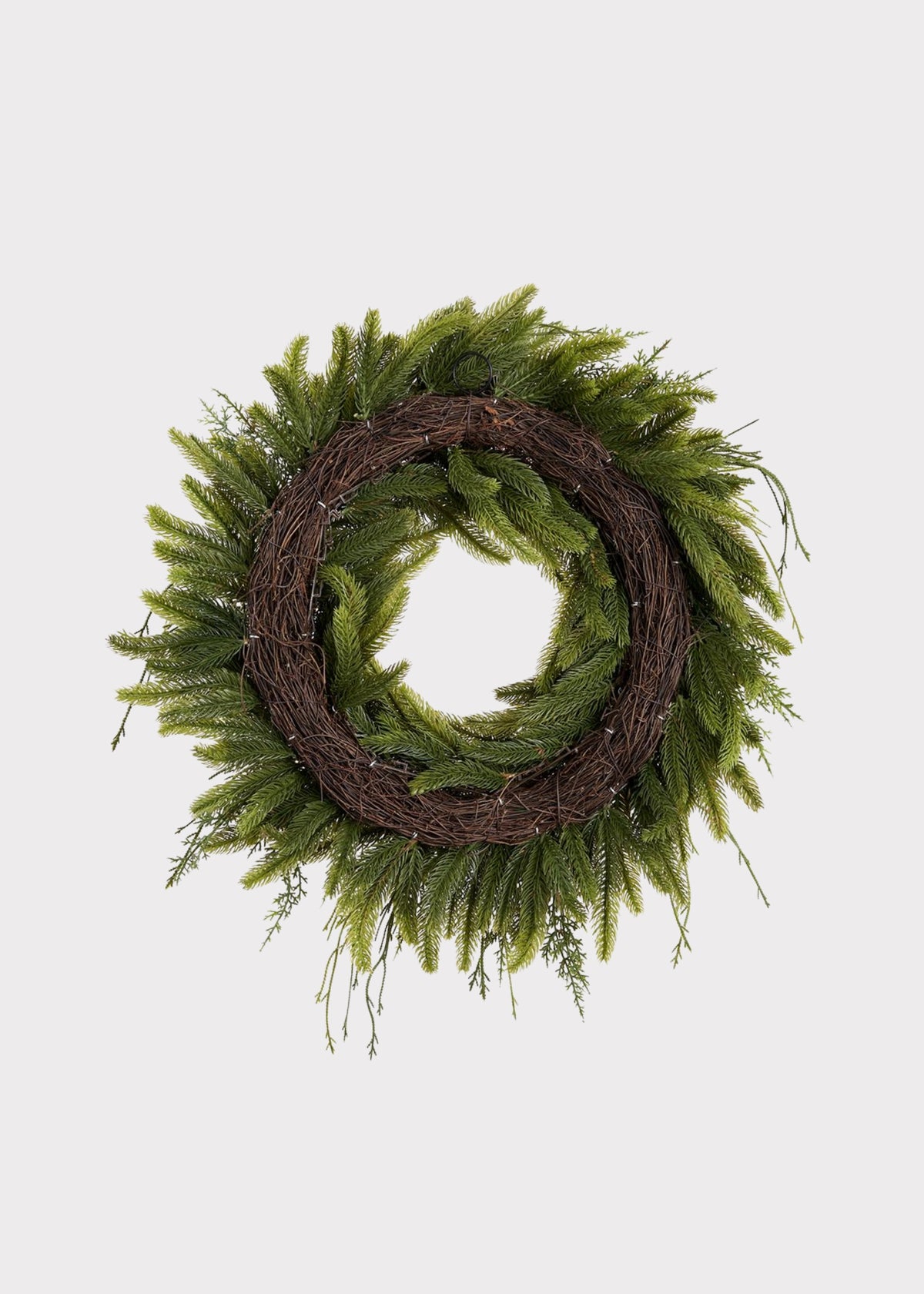 Back of a Green Fake Winter Pine and Sedum Wreath with Red Berries