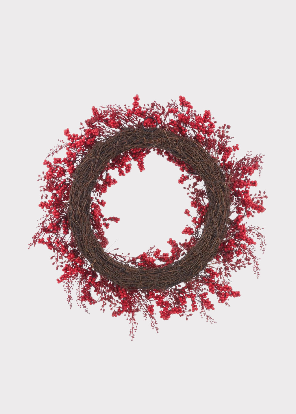 Back of a Red Artificial Berry and Sedum Christmas Wreath