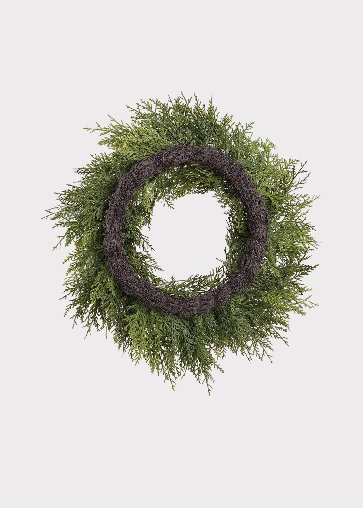 Back of a Natural Touch Artificial Cedar Wreath