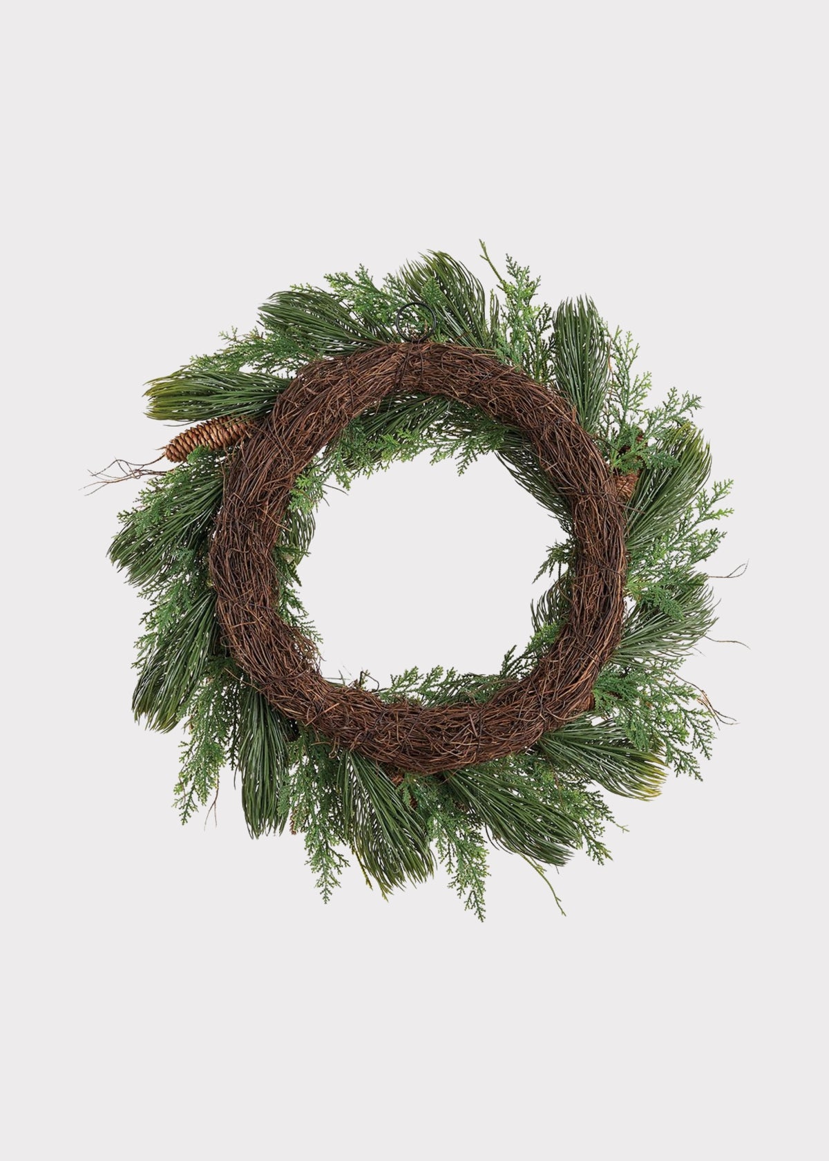 Back of a Artificial Holiday Pine Foliage Wreath with Cones