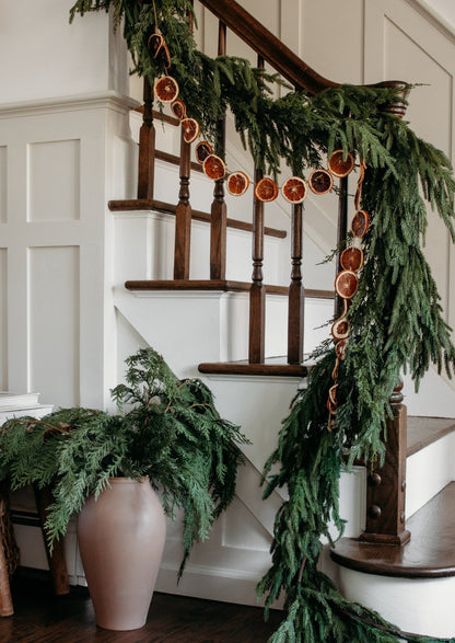 Afloral Deluxe Faux Norfolk Garland Styled on Staircase Banister