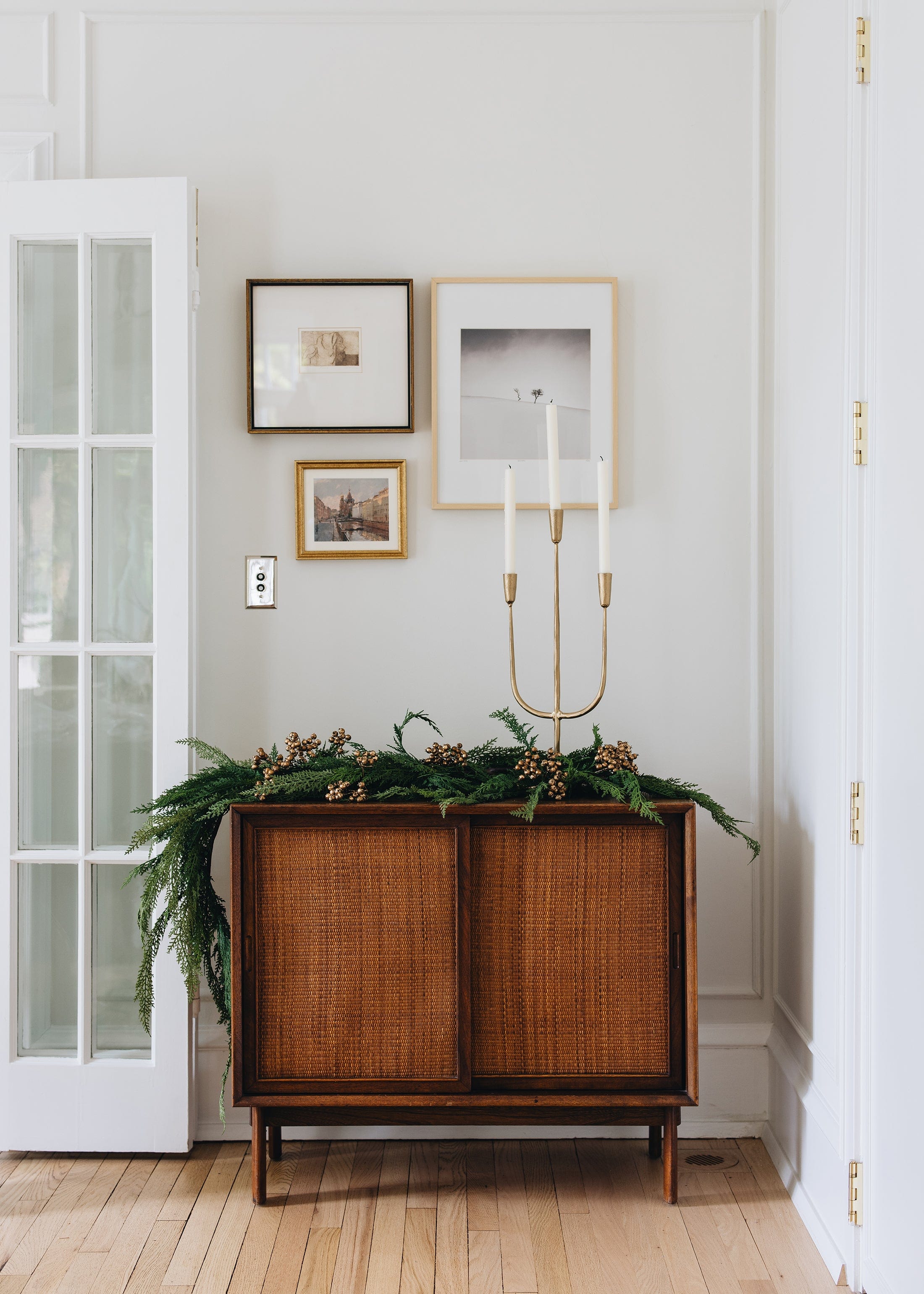 Table Styling in Home with Candelabra and Faux Winter Garland