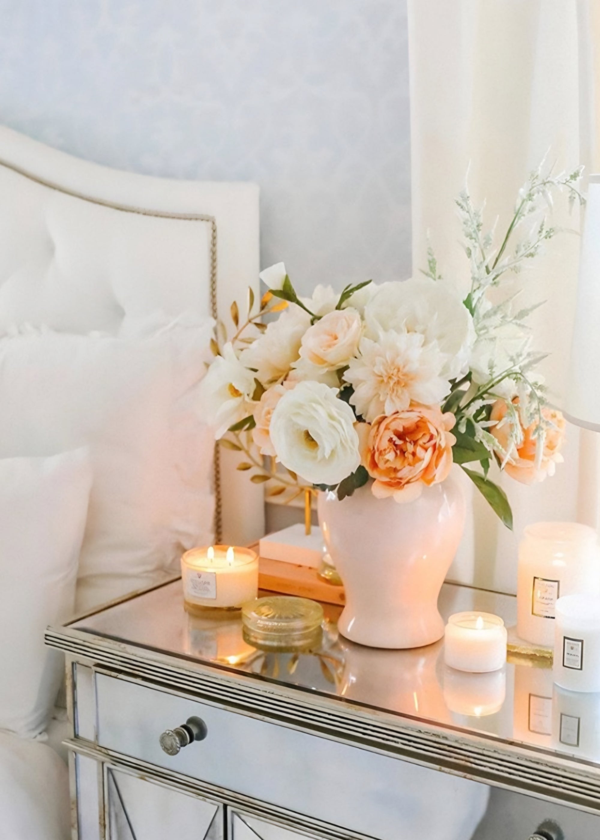 artificial flower arrangement with peonies, roses, and dahlias