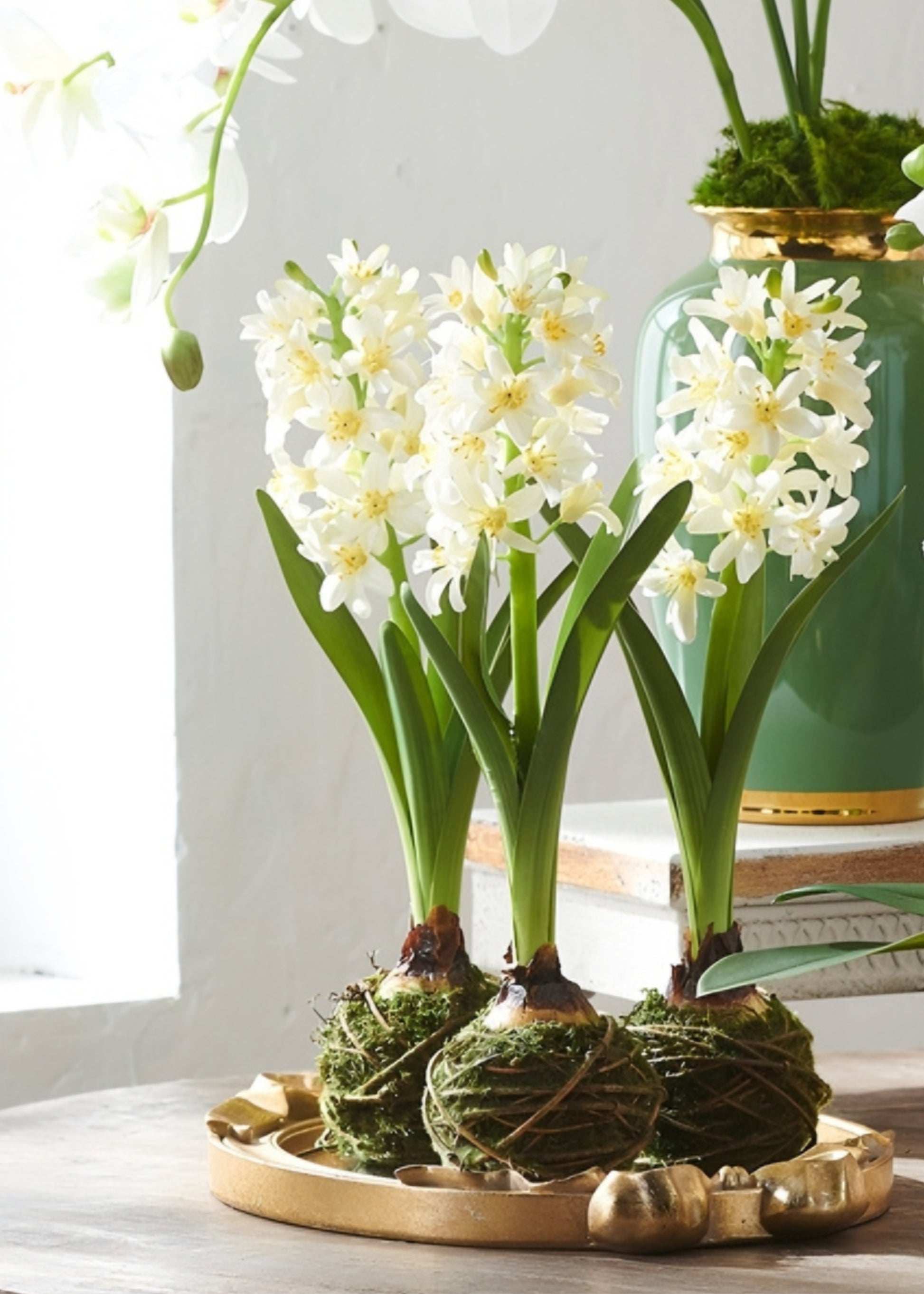 Fake white Hyacinths styled on a gold tray