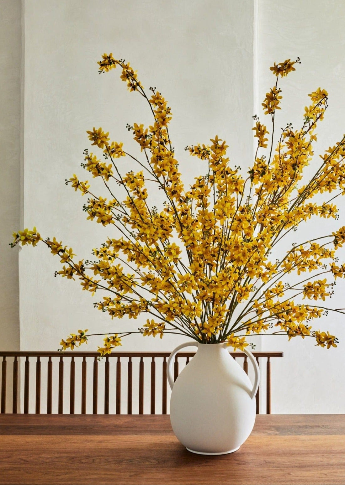 Artificial Forsythia Branches Styled in White Ceramic Jug Vase at afloral