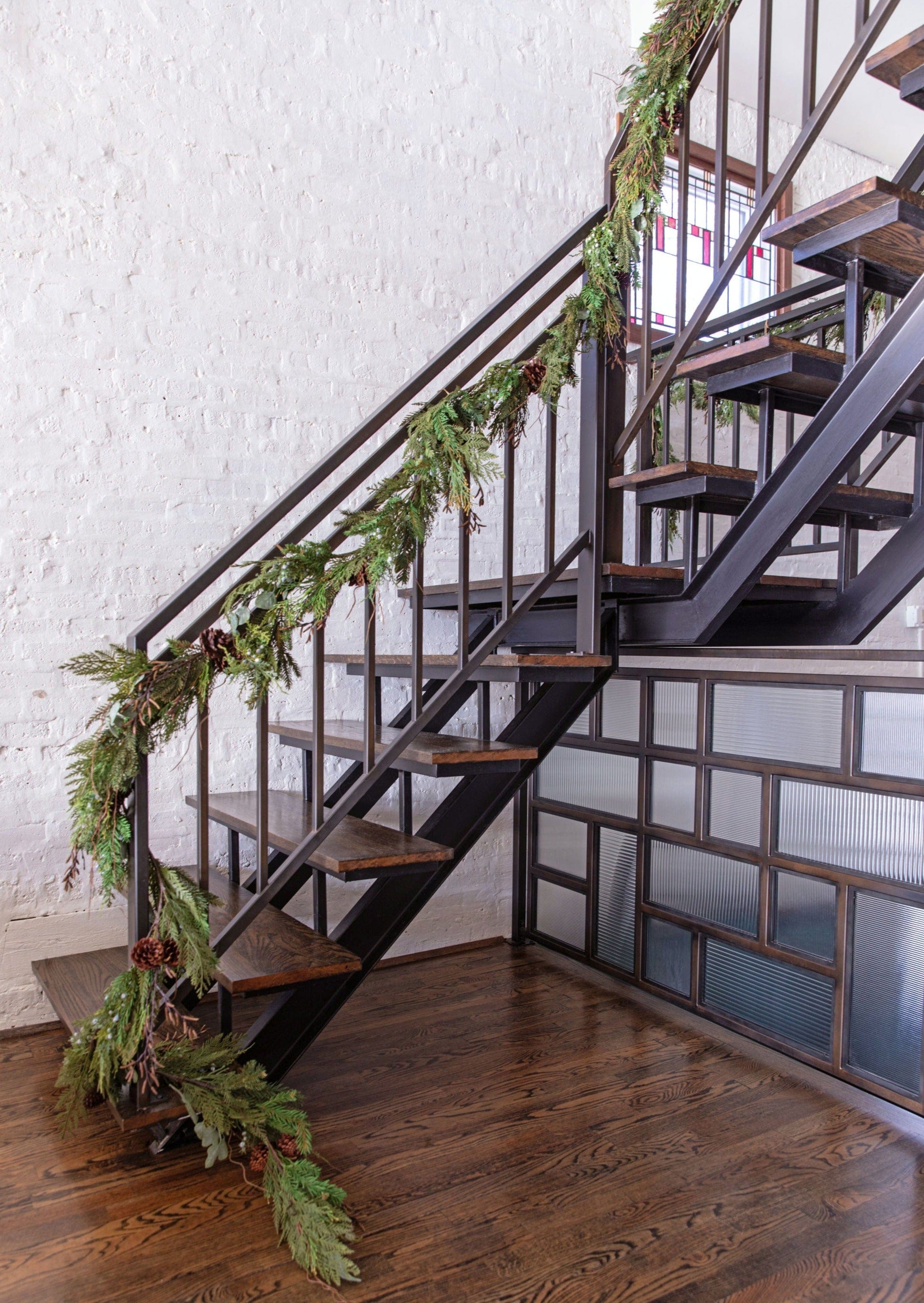 Cedar and Pine Garland on Stair Rail