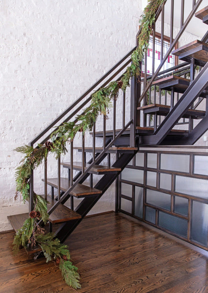Cedar and Pine Garland on Stair Rail