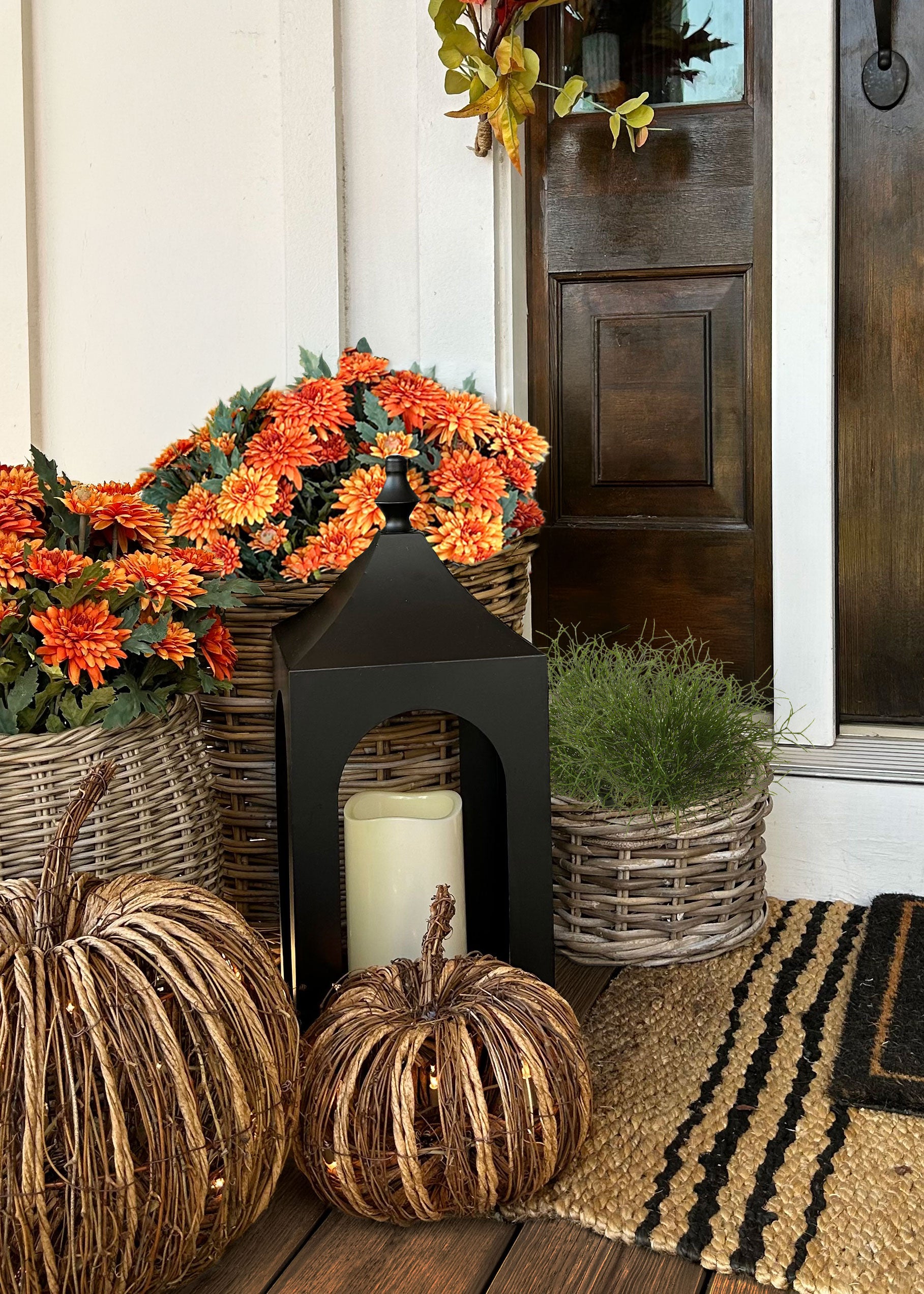 Porch with mums and grass bush